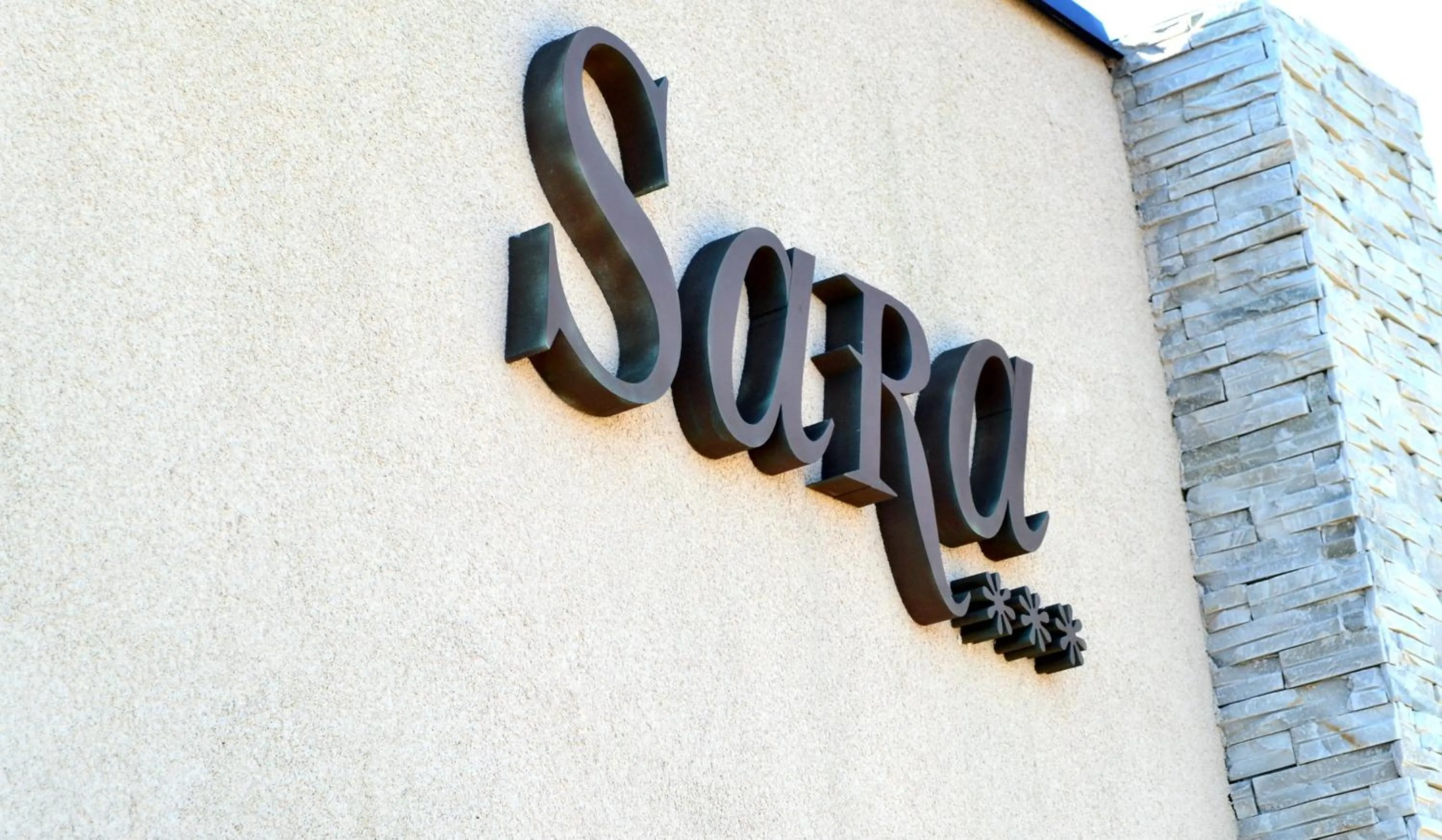 Property logo or sign in Sara