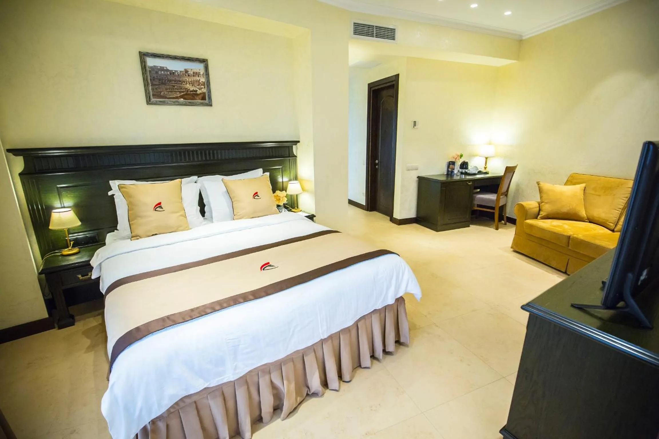 Seating area, Bed in Colosseum Marina Hotel