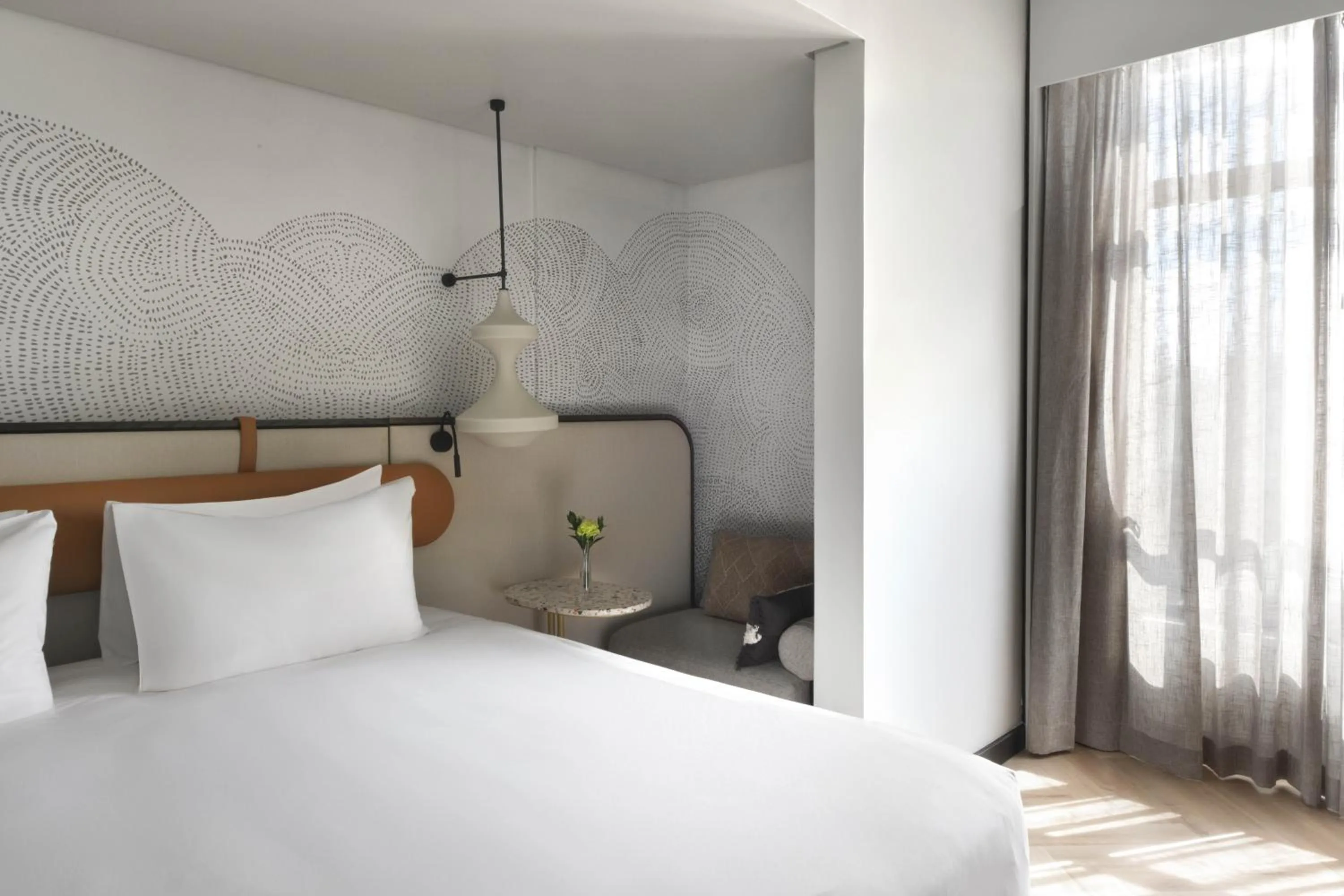 Bed in Mövenpick Kigali