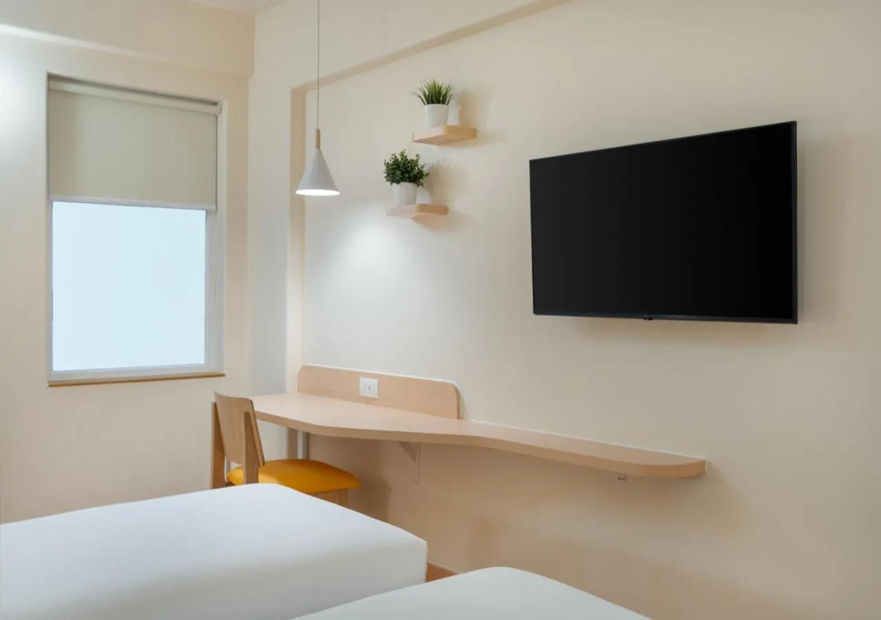 Bedroom, Bed in Bloom Hotel - Whitefield