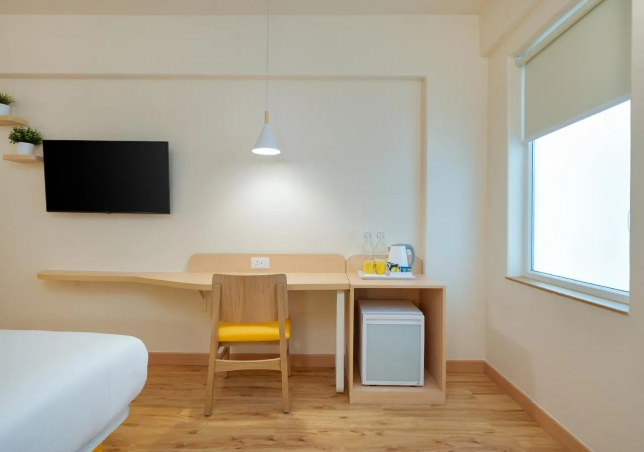 Bedroom, Bed in Bloom Hotel - Whitefield