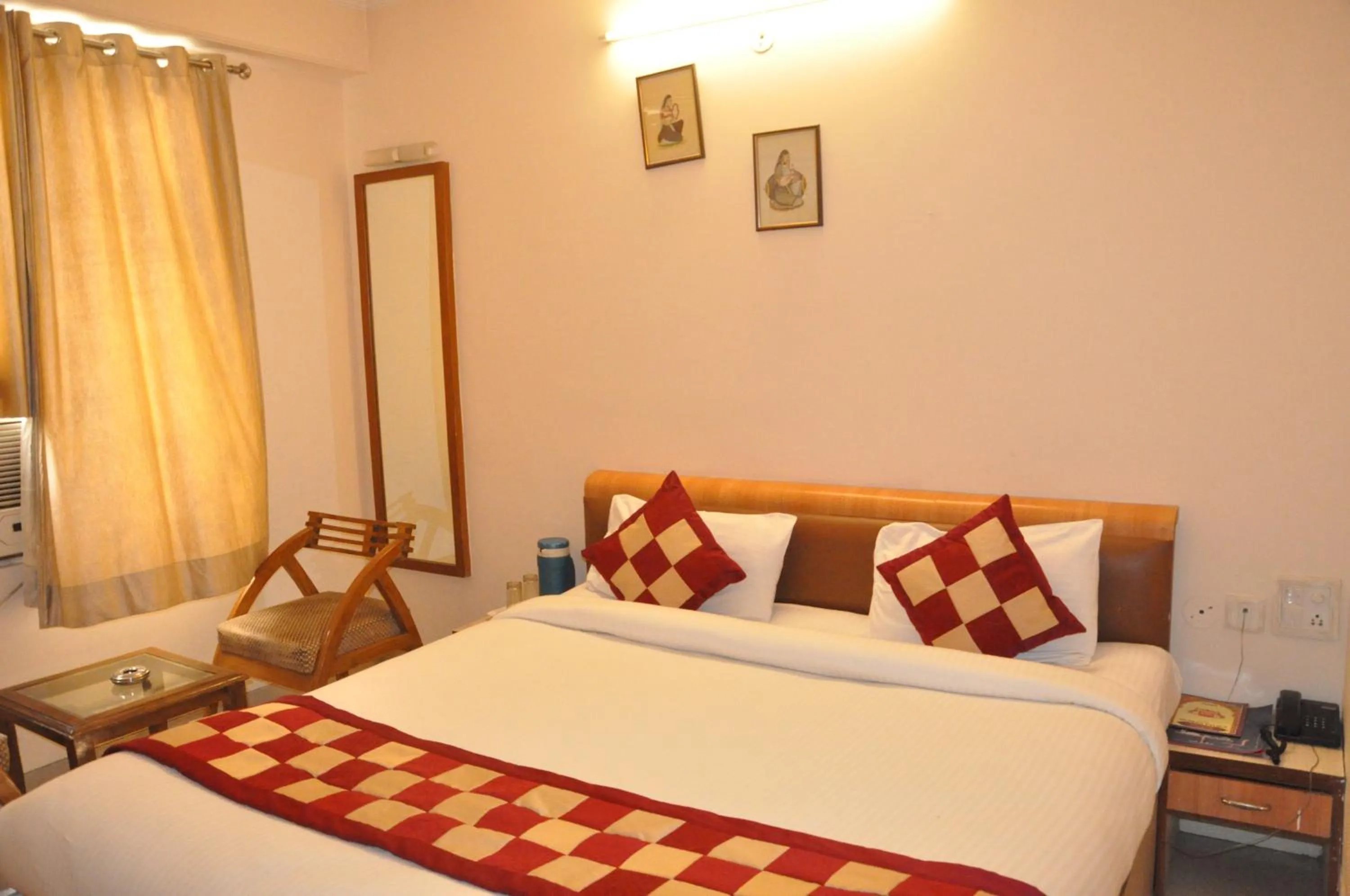 Bed in Hotel Muskan Palace