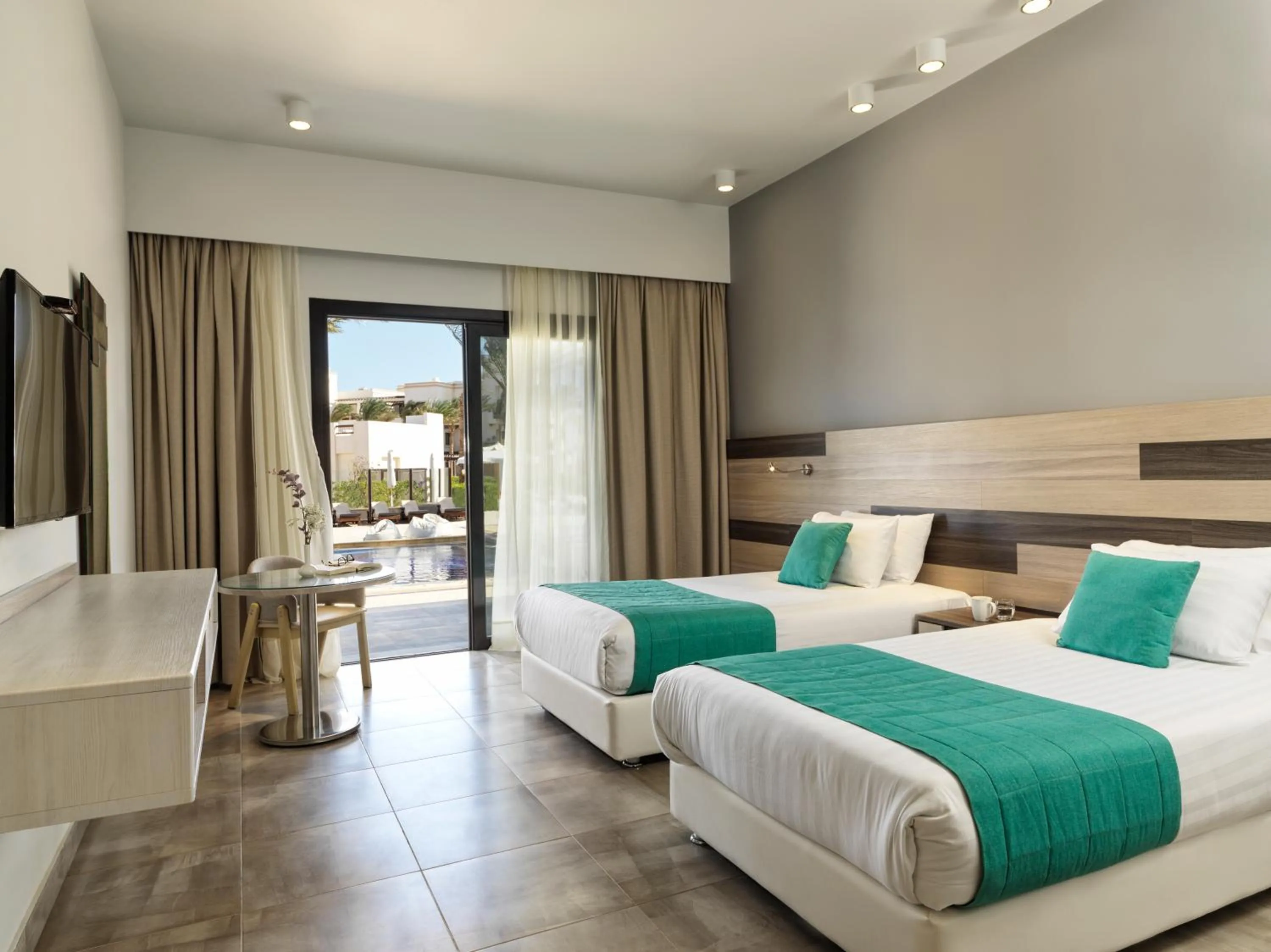 Photo of the whole room, Bed in Ancient Sands Golf Resort and Residences