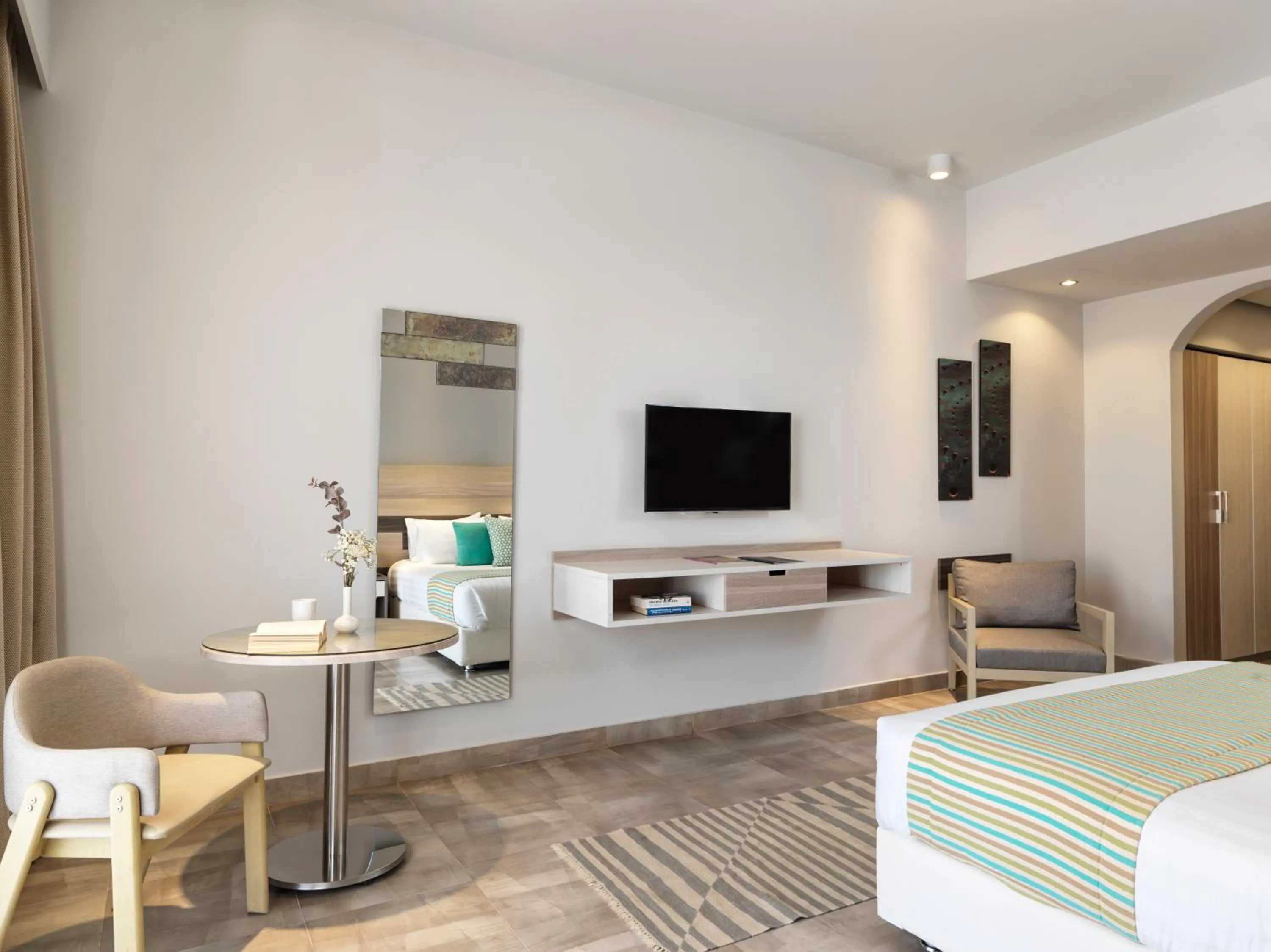 TV and multimedia in Ancient Sands Golf Resort and Residences