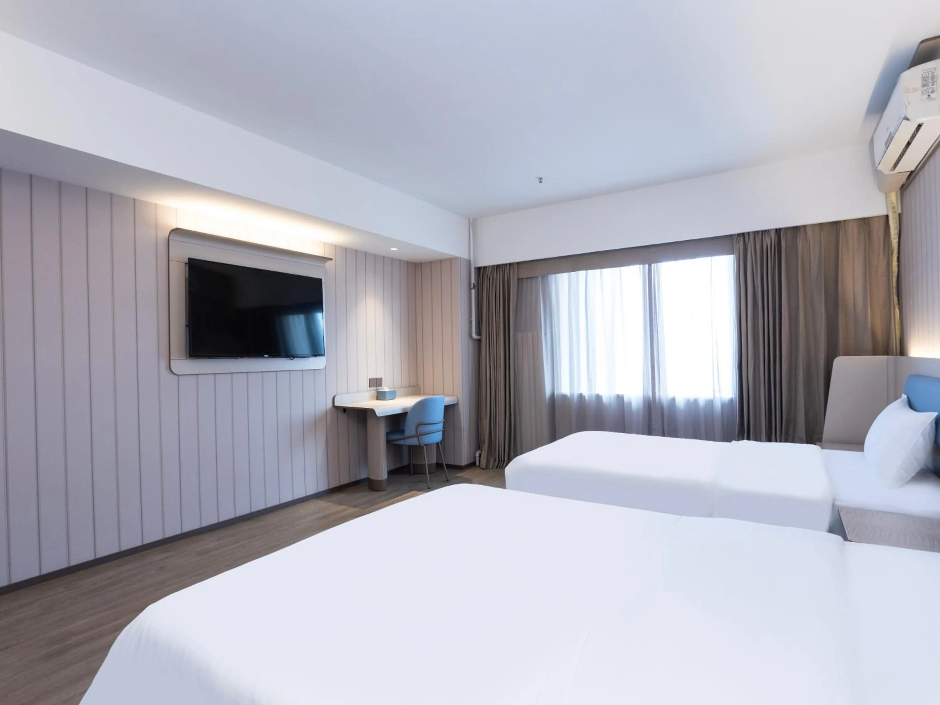 Bed in Hanting Hotel Beijing West Railway Station North Square