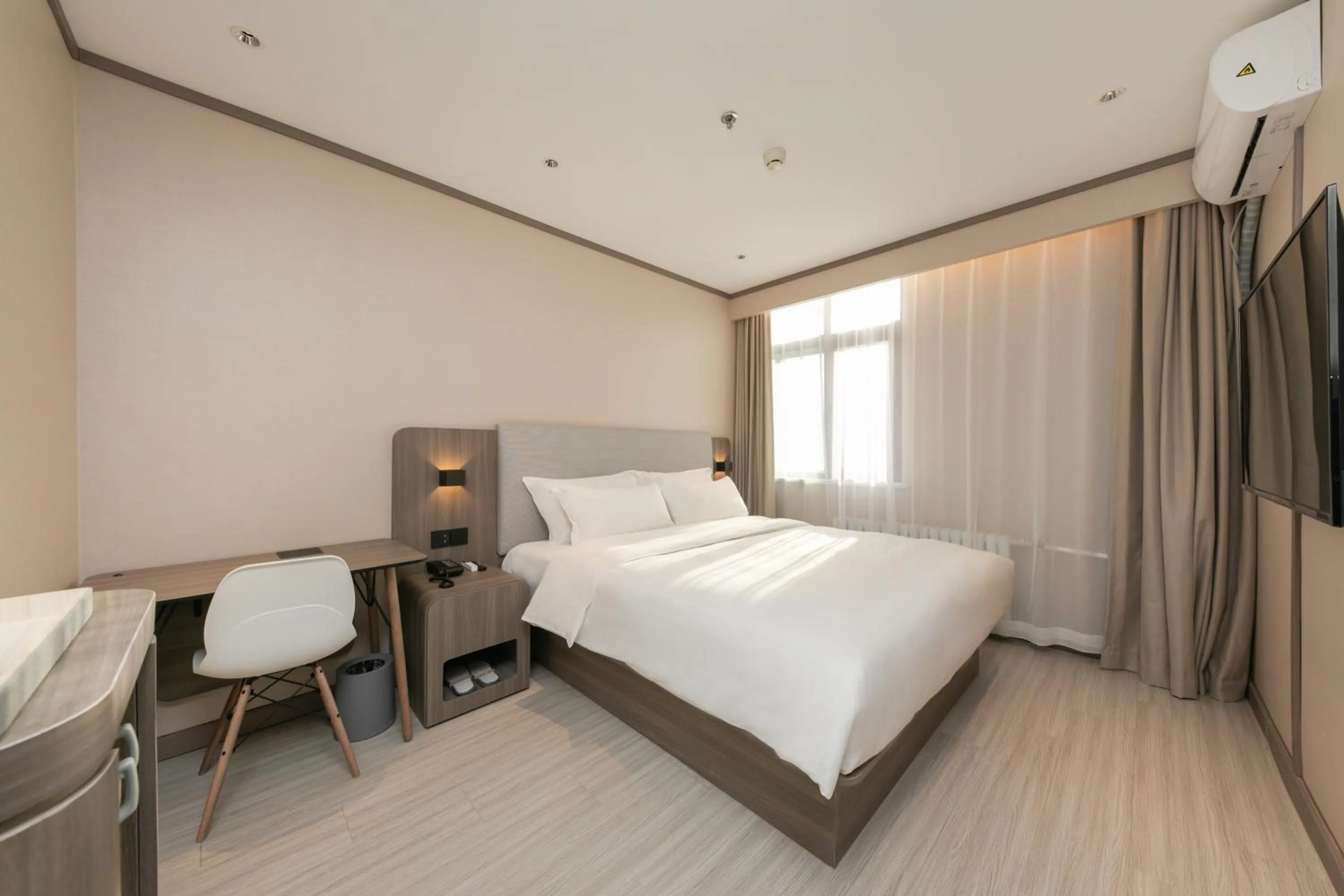 Bed in Hanting Hotel Beijing South Railway Station Gongyi Dongqiao