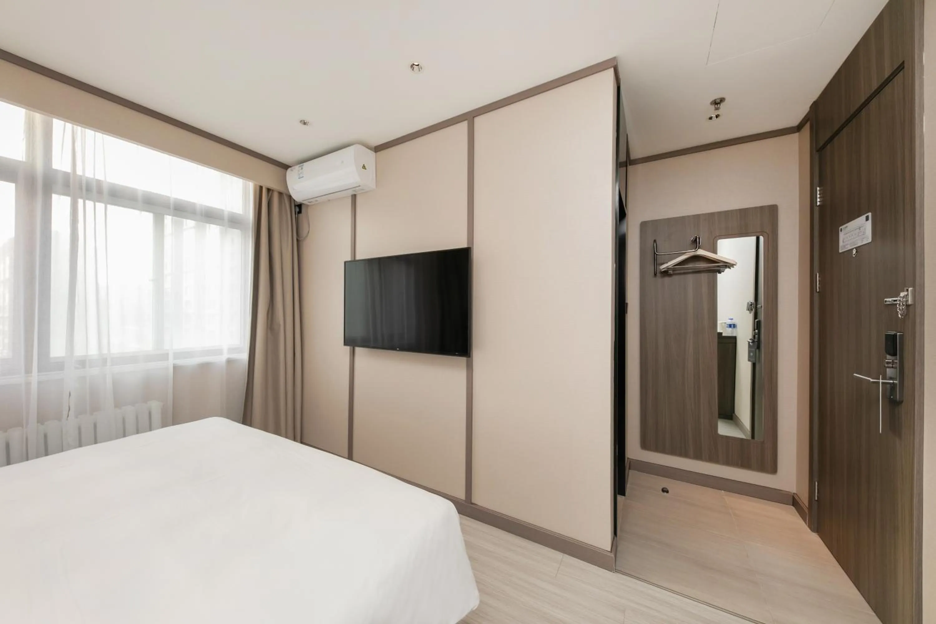 Bed in Hanting Hotel Beijing South Railway Station Gongyi Dongqiao