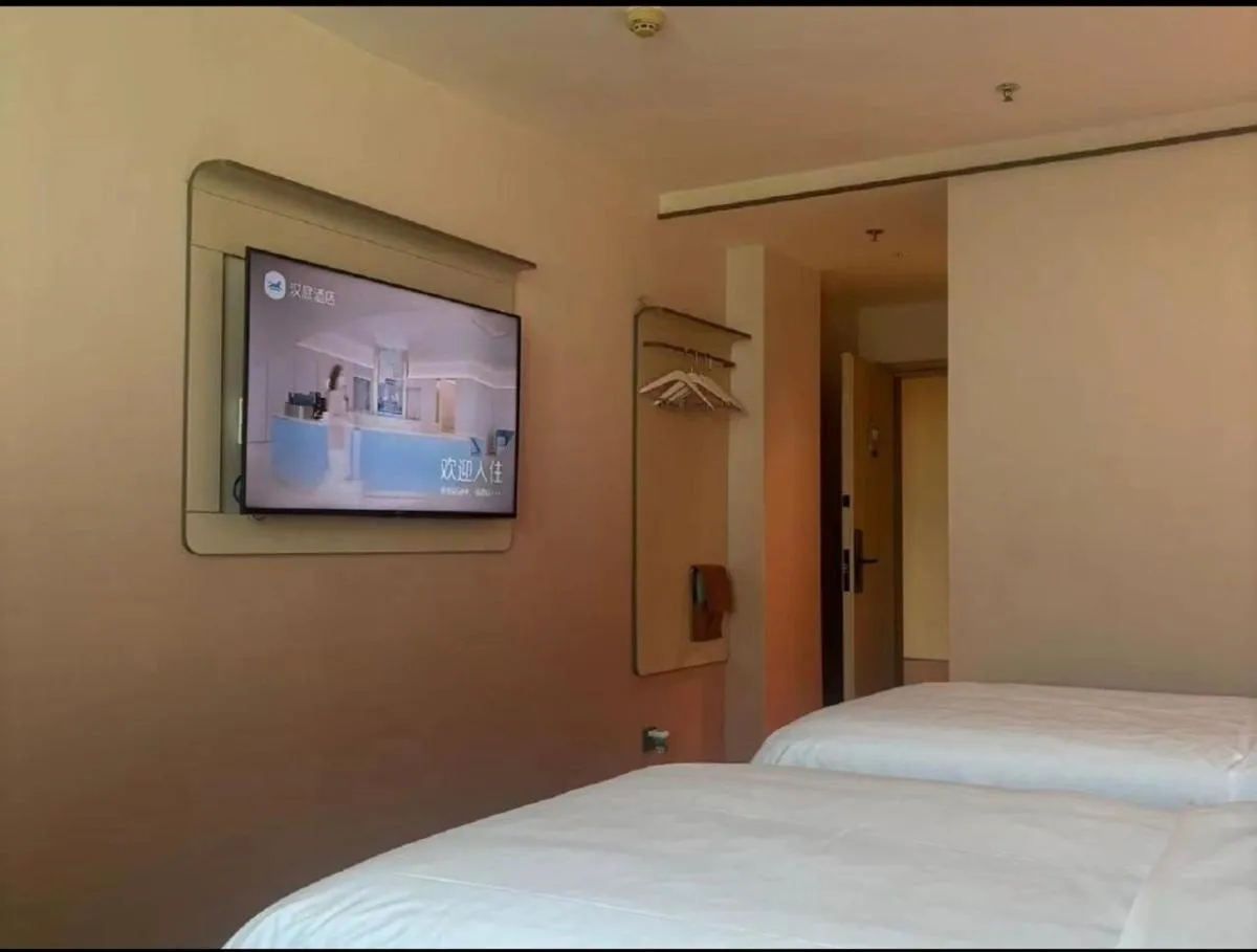 Bed in Hanting Hotel Beijing New International Exhibition Center