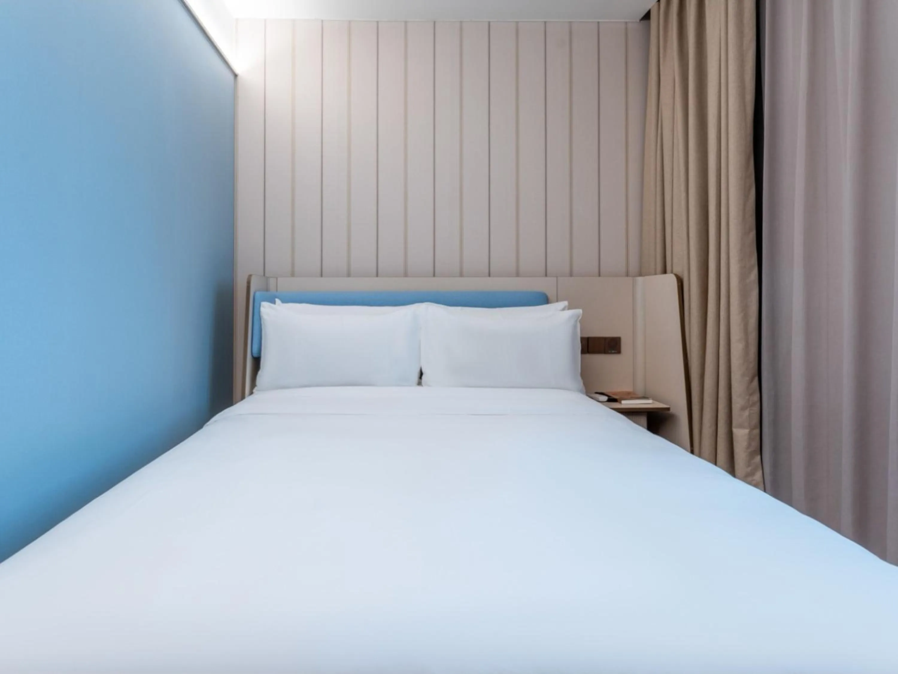 Bed in Hanting Hotel Shanghai Meilong Wanhui International Plaza