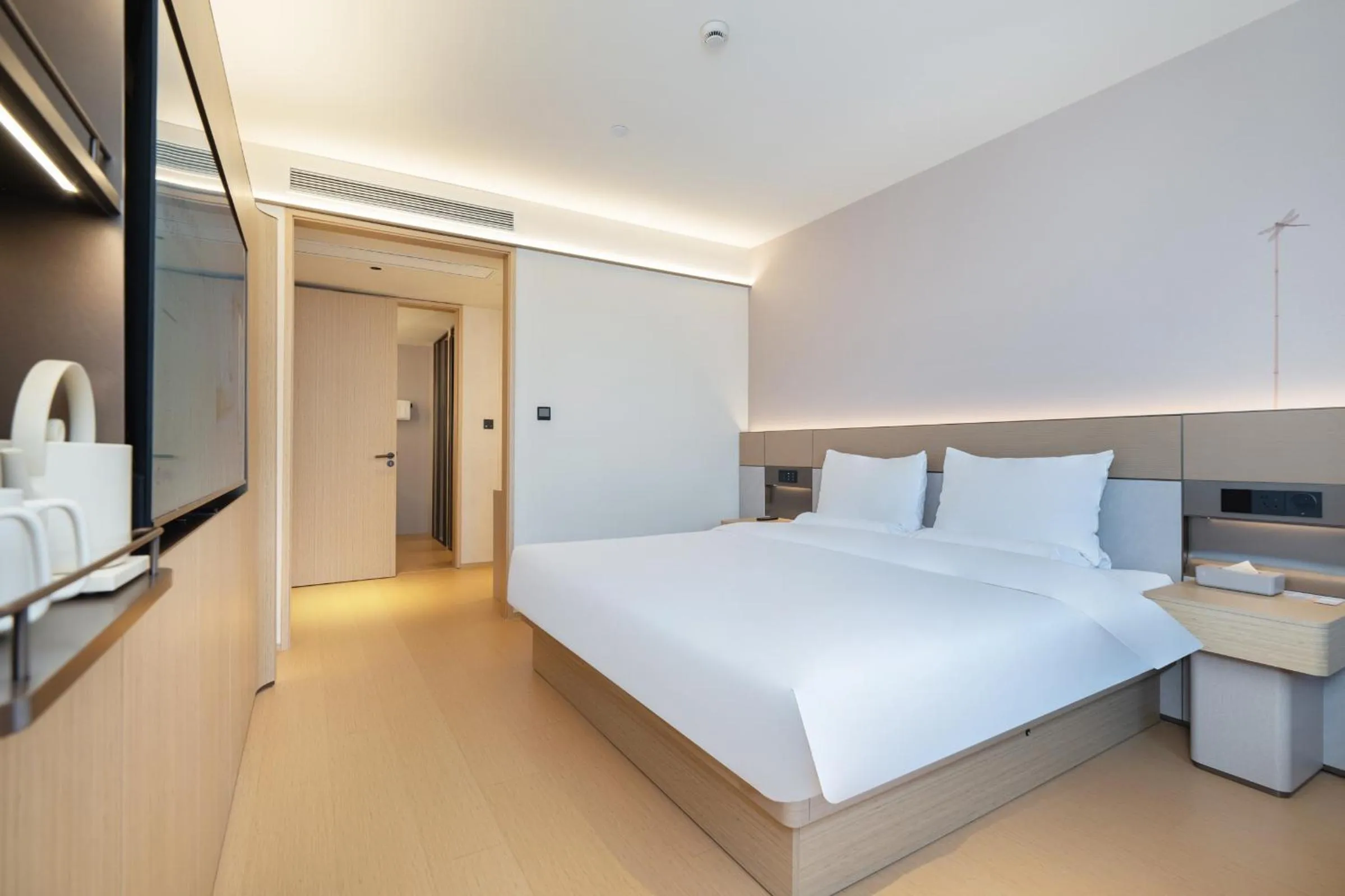 Bed in JI Hotel Shanghai Jiuting Center