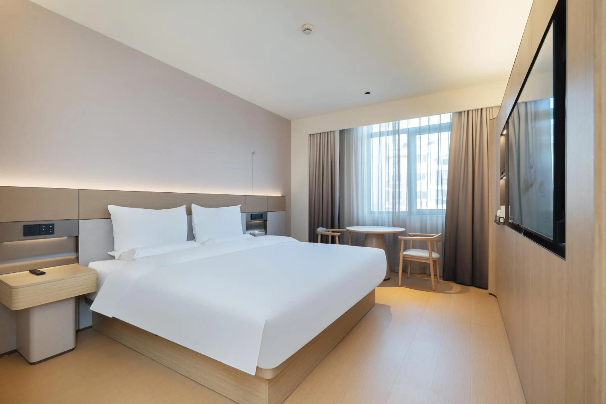 Bed in JI Hotel Shanghai Jiuting Center