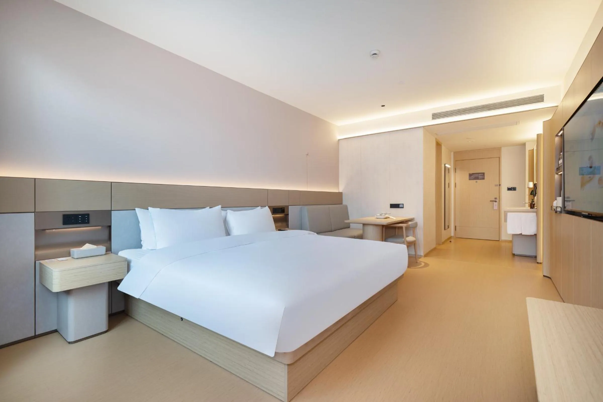 Bed in JI Hotel Shanghai Jiuting Center