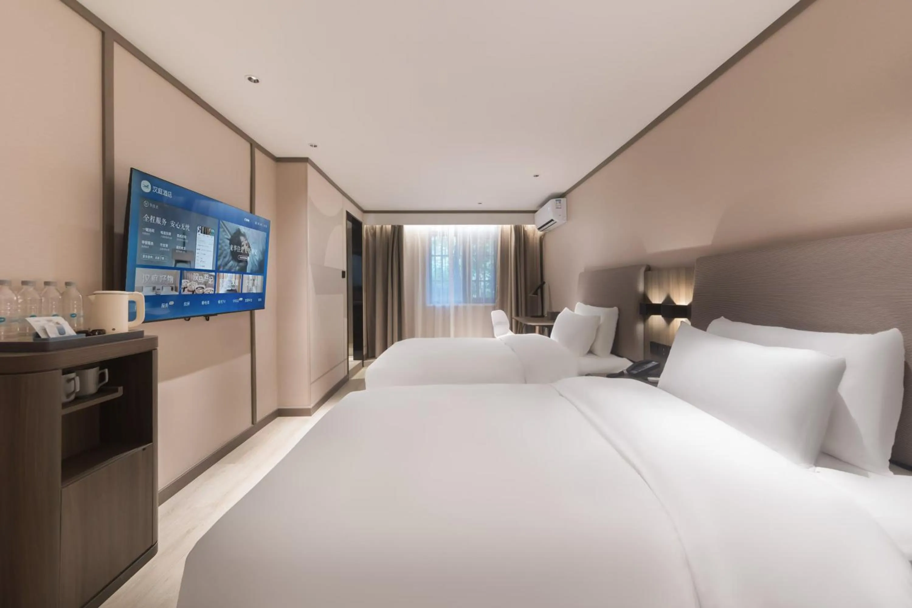 Bed in Hanting Hotel Nanjing Jiangpu Longhua Road Subway Station