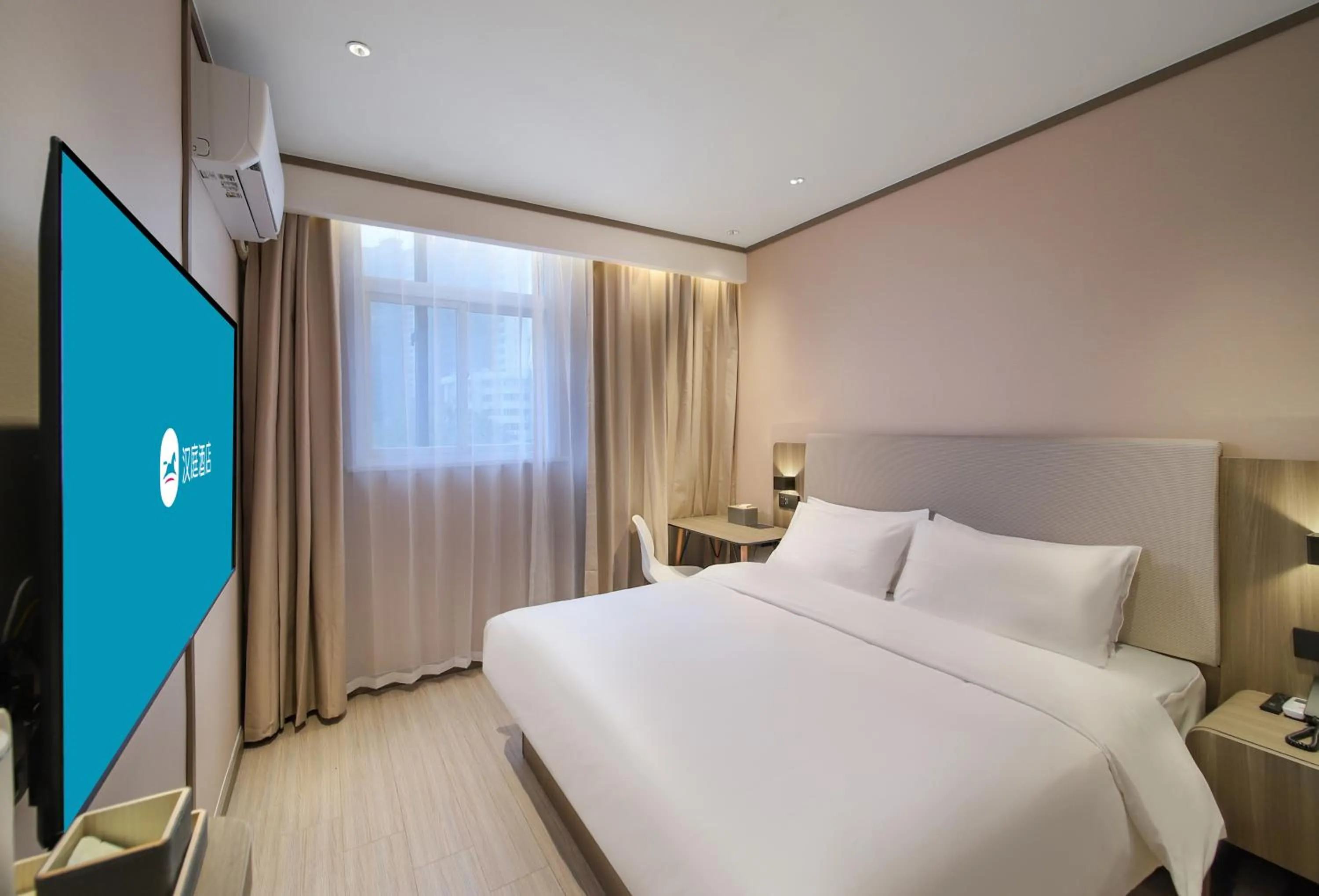 Bed in Hanting Hotel Nanjing Jiangpu Longhua Road Subway Station