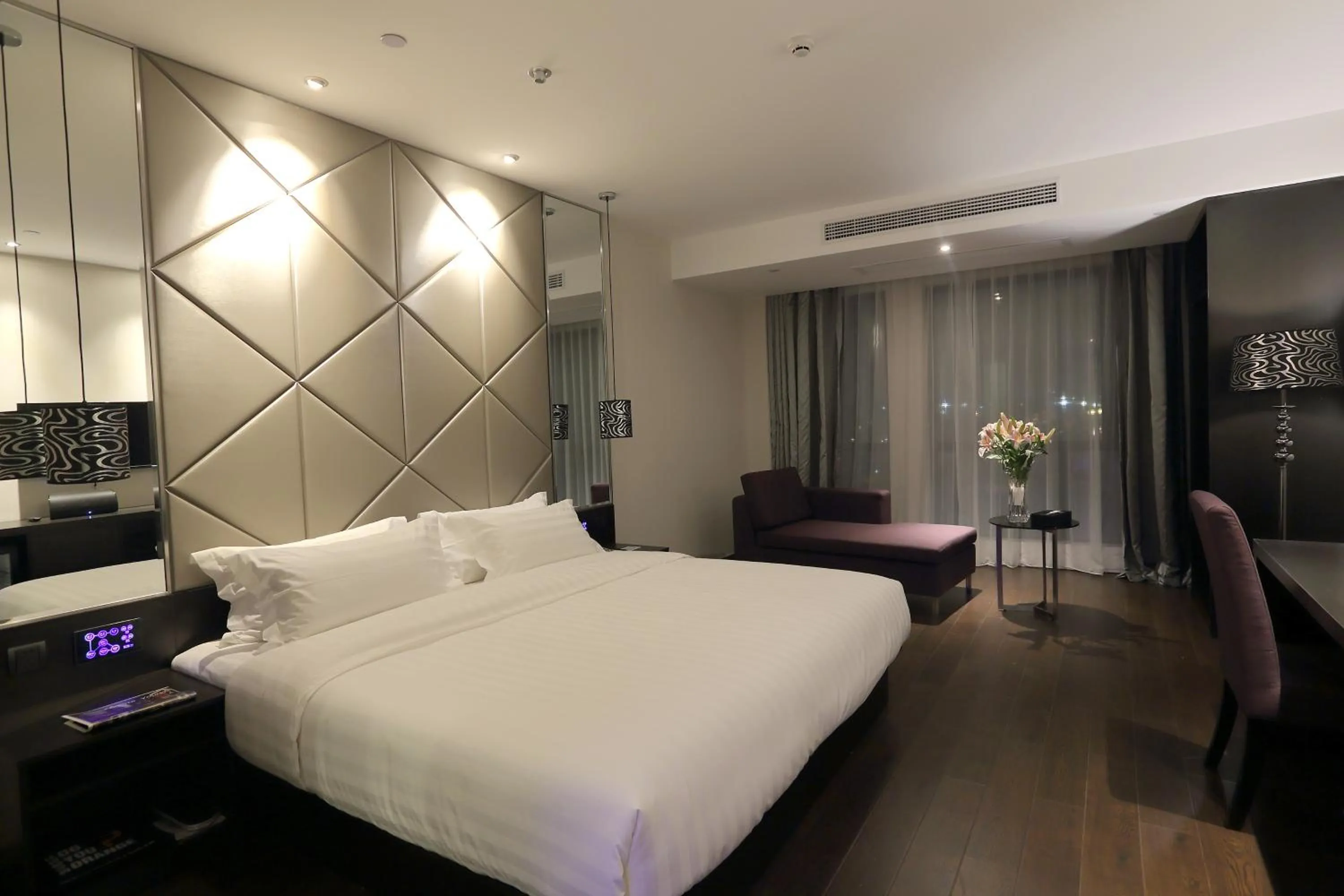 Bed in Orange Hotel Hangzhou Jiubao Passenger Transport Center