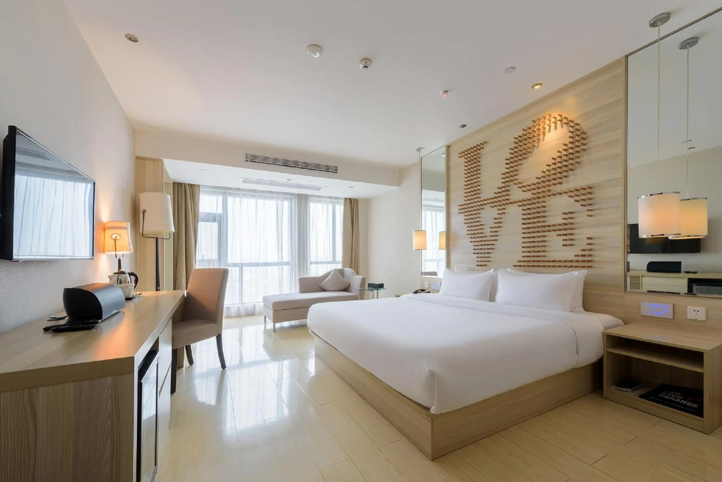 Bed in Orange Hotel Hangzhou Jiubao Passenger Transport Center