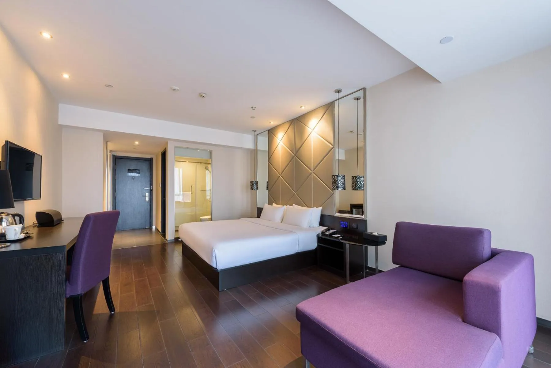 Bed in Orange Hotel Hangzhou Jiubao Passenger Transport Center