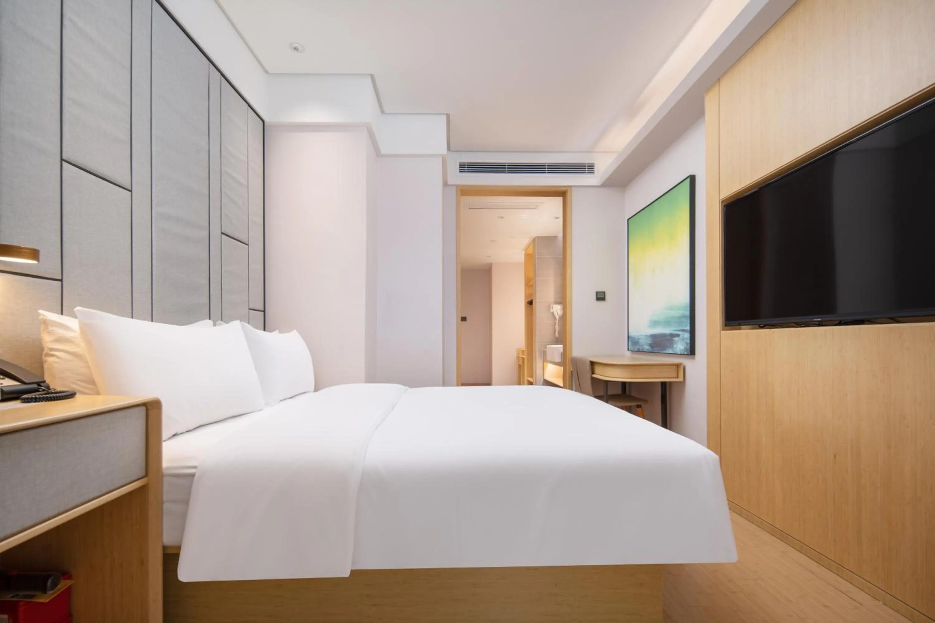 Bed in JI Hotel Chongqing Liangjiang Happiness Plaza