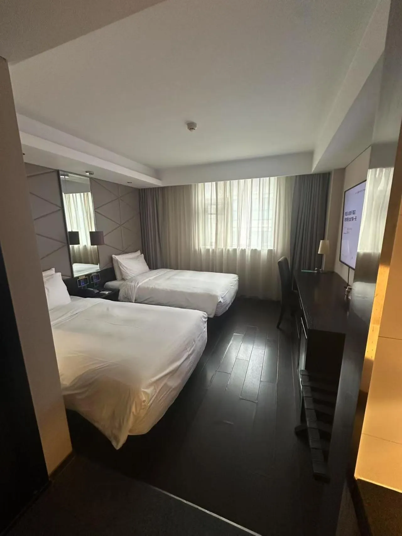 Photo of the whole room, Bed in Orange Hotel Shanghai North Xizang Road Subway Station