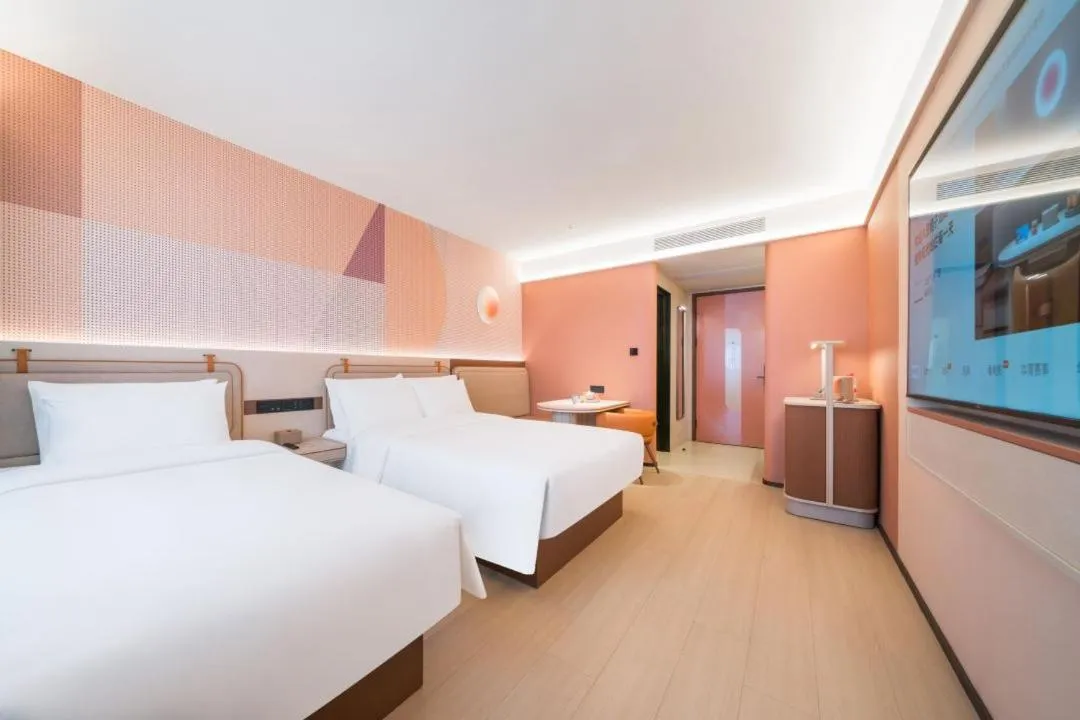 Bed in Orange Hotel Hangzhou West Lake Huanglong Sports Center