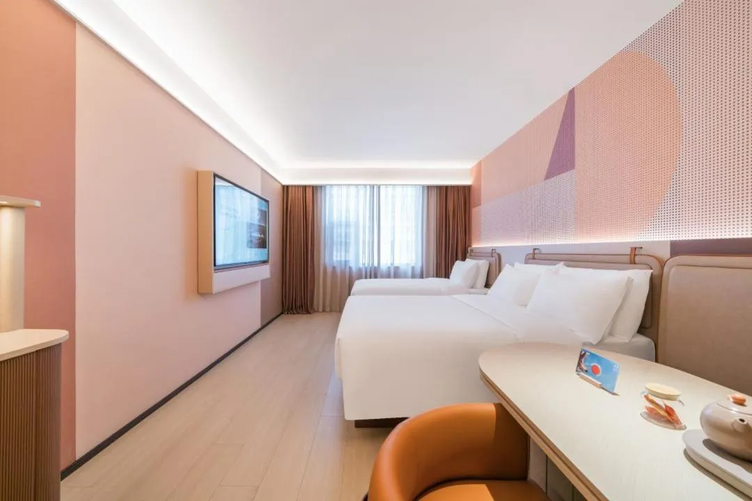 Bed in Orange Hotel Hangzhou West Lake Huanglong Sports Center