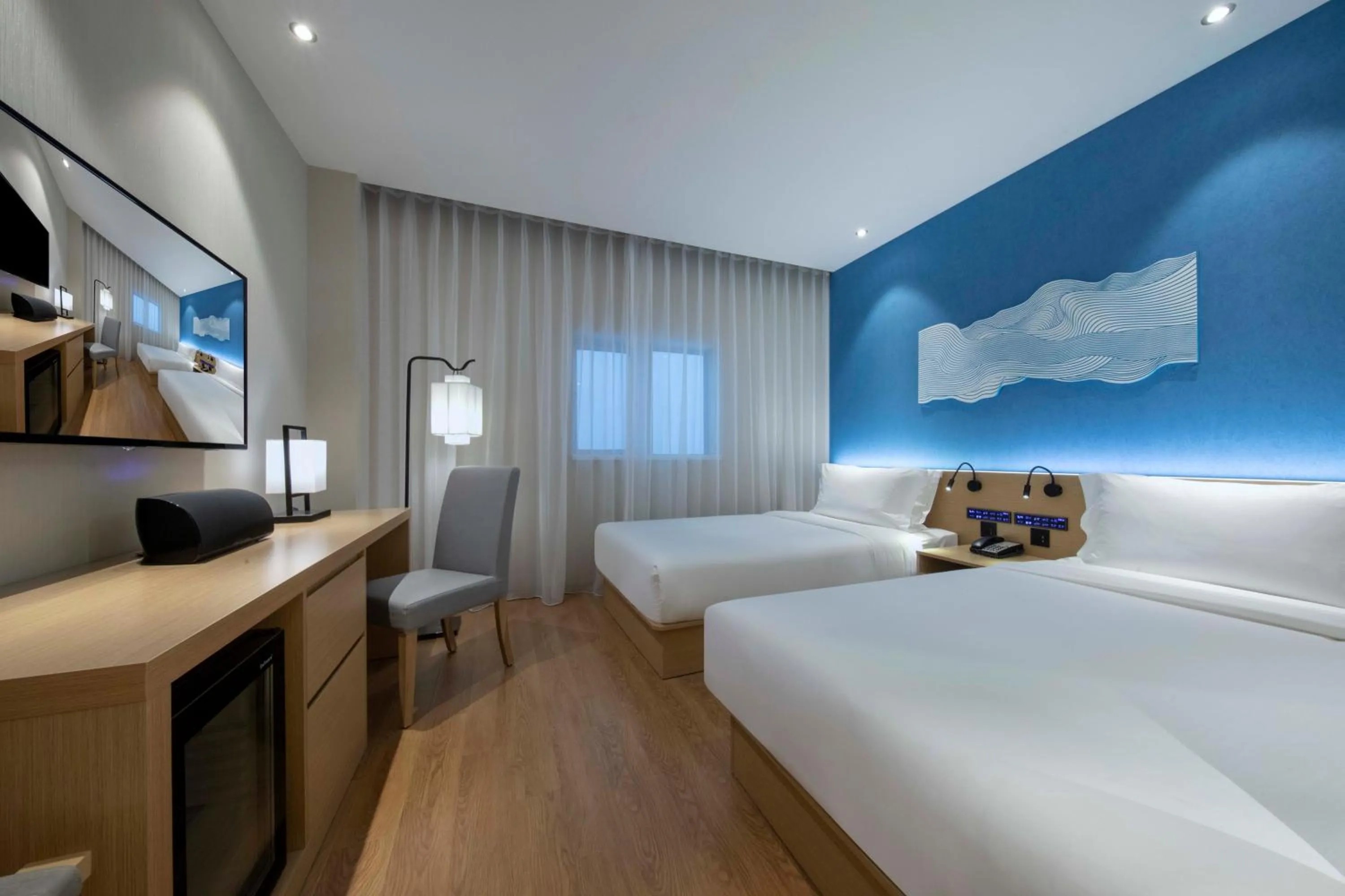 Bed in Orange Hotel Shanghai Hongqiao Railway Station Qixin Road (formerly Hongqiao National Exhibition and Convention Center Qixin Road Branch)