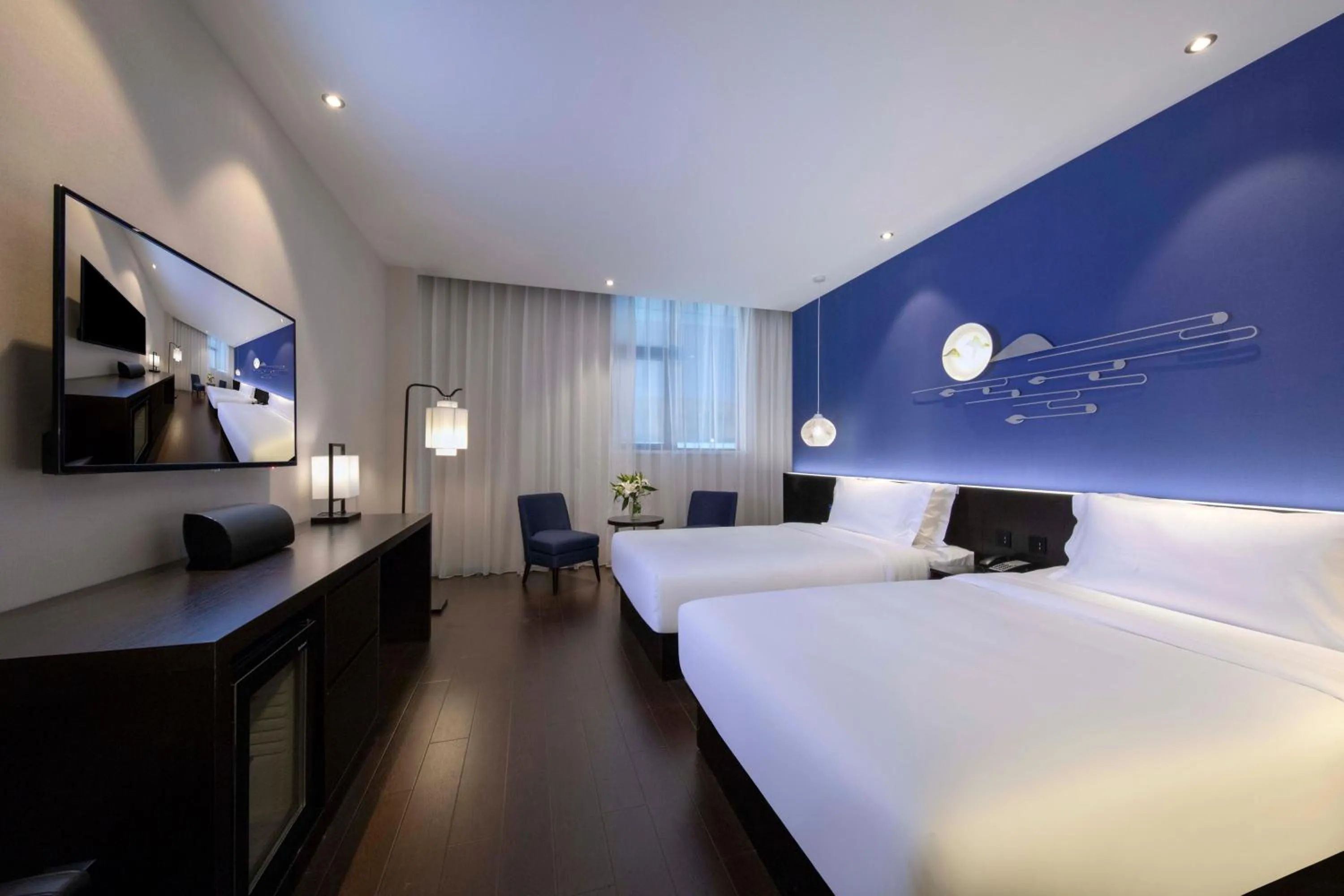Photo of the whole room, Bed in Orange Hotel Shanghai Hongqiao Railway Station Qixin Road (formerly Hongqiao National Exhibition and Convention Center Qixin Road Branch)