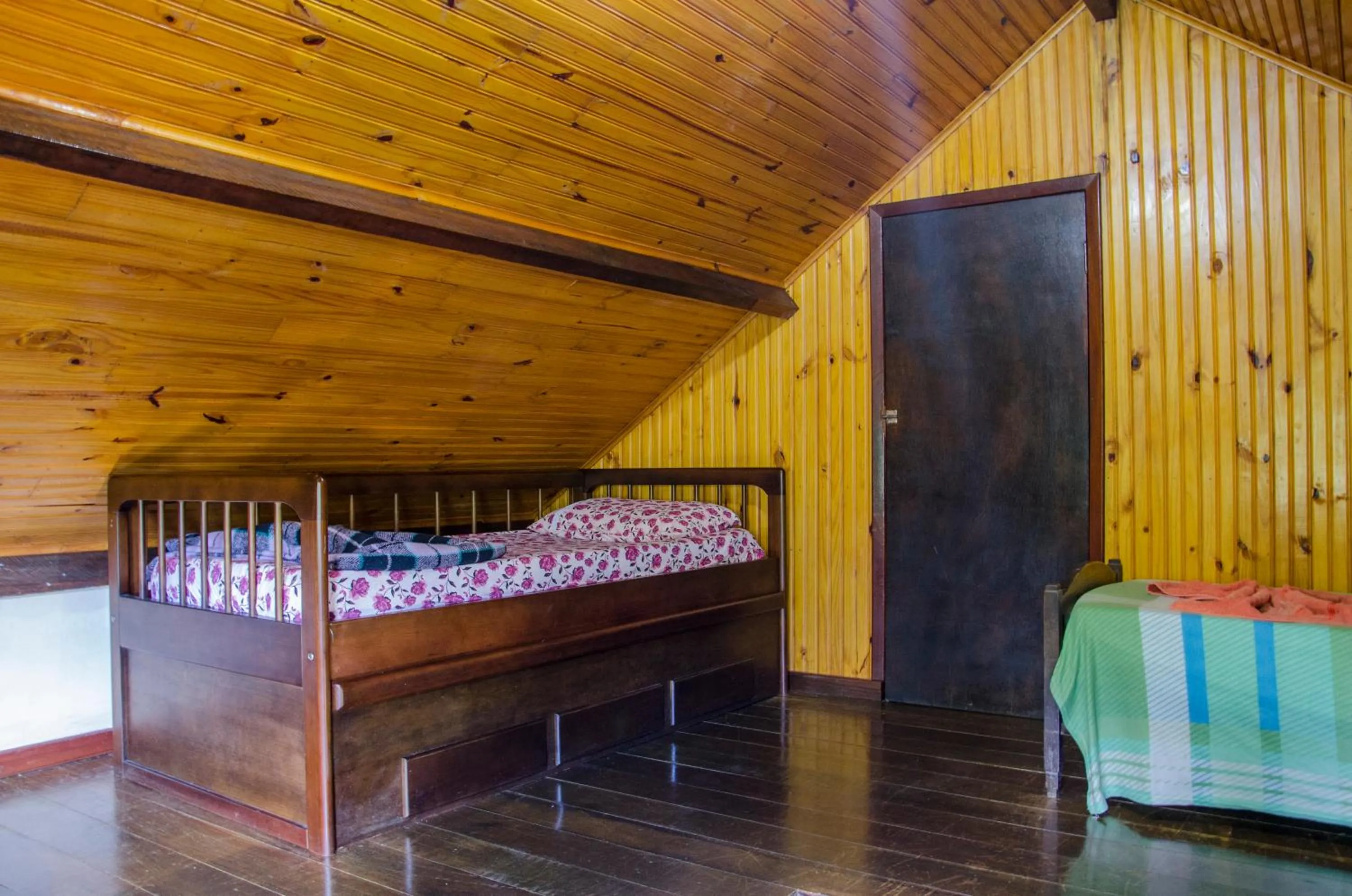 Bed in Chalés Lirio dos Vales