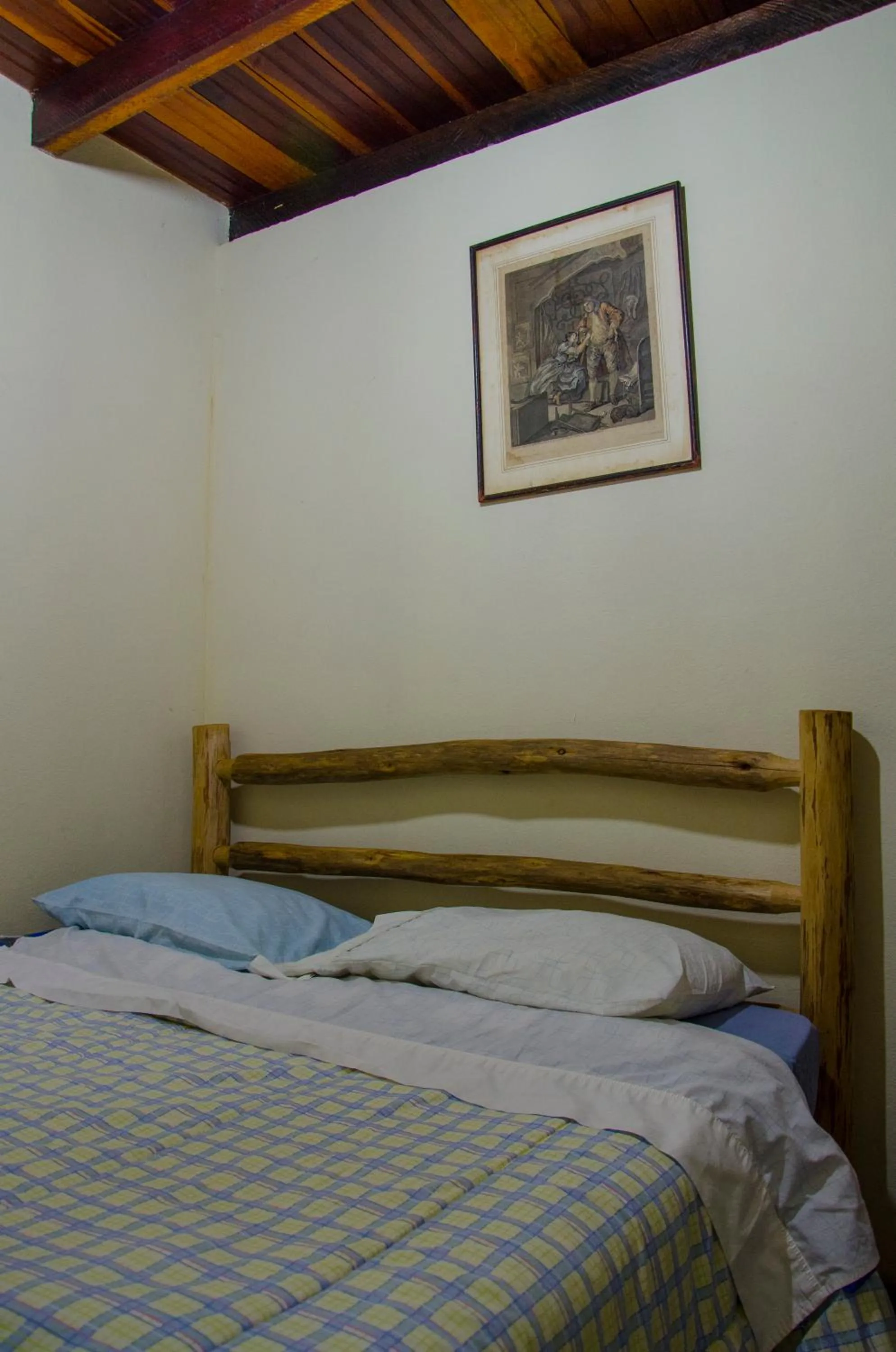 Bed in Chalés Lirio dos Vales