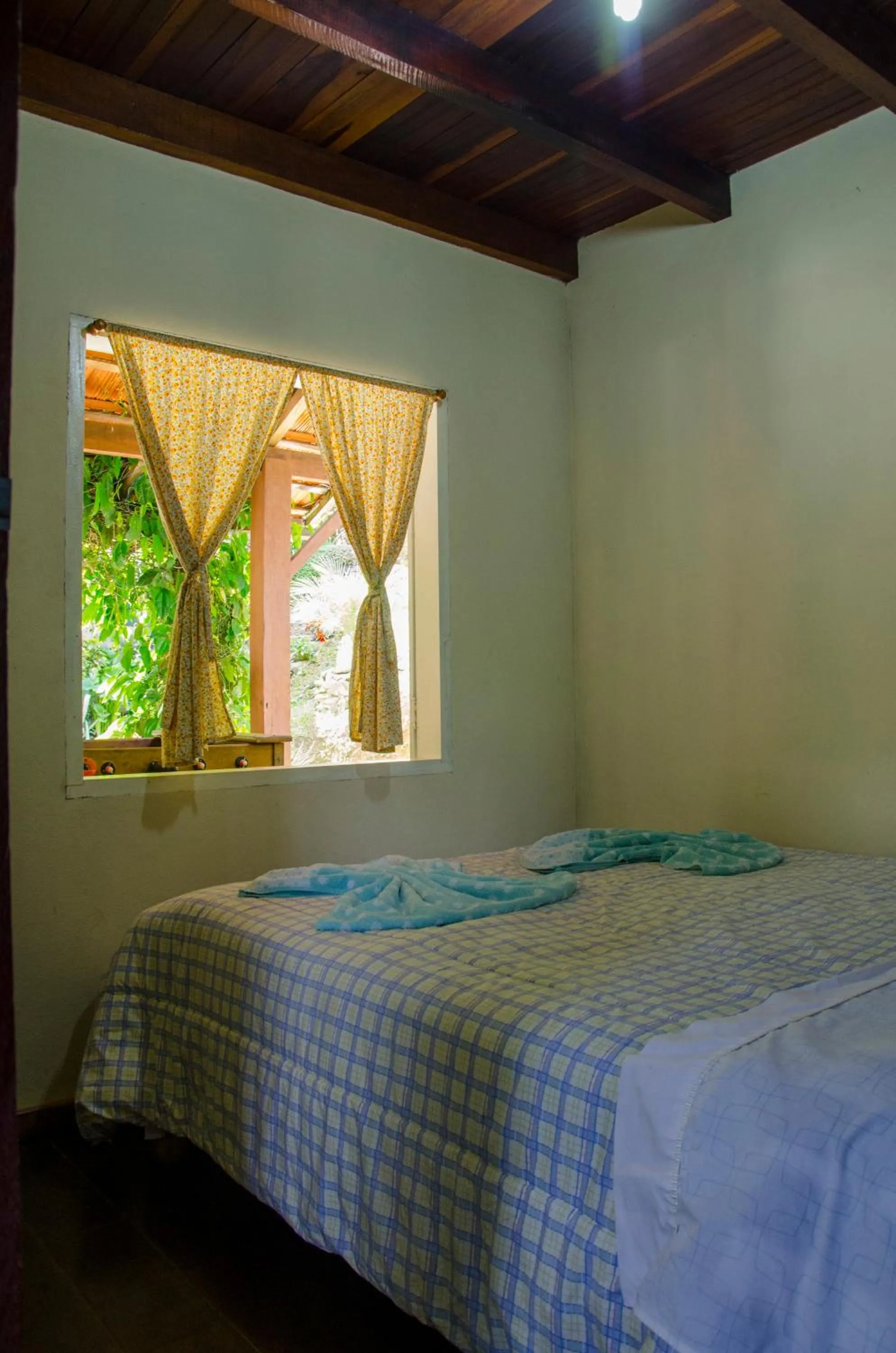 Bed in Chalés Lirio dos Vales