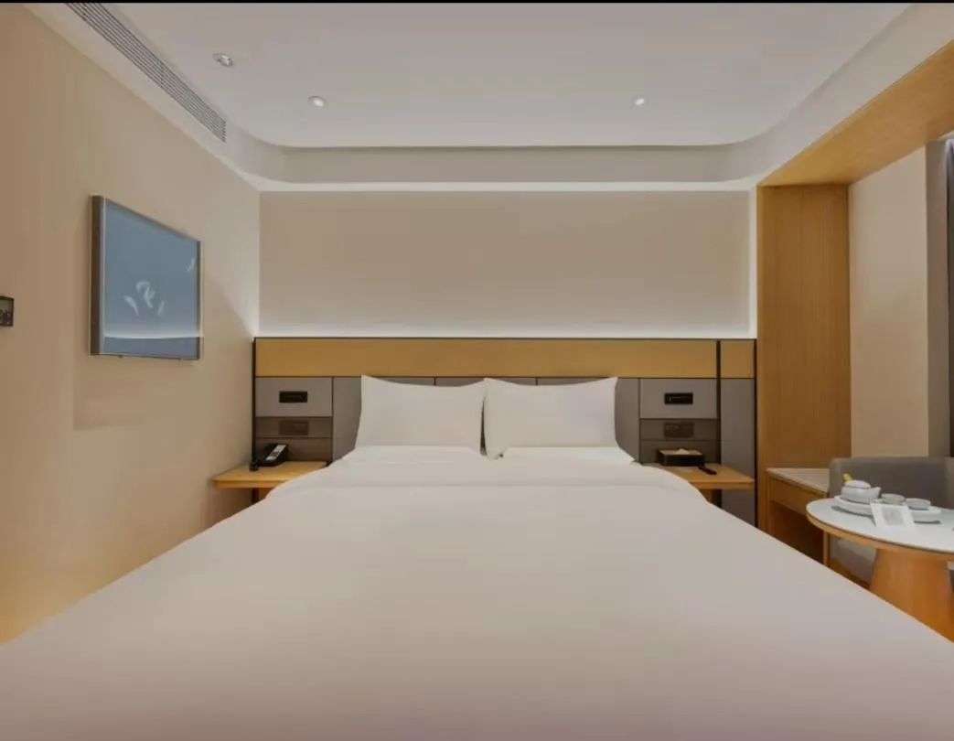 Bed in JI Hotel Beijing South Railway Station Jiaomen West Subway Station