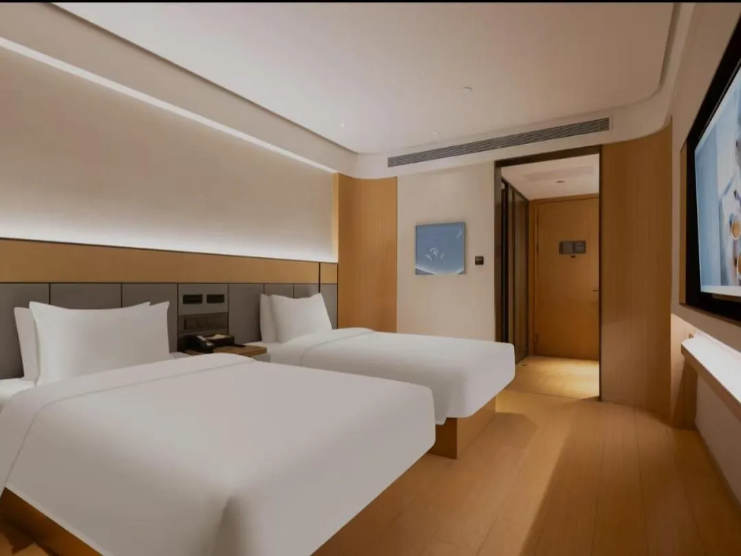 Bed in JI Hotel Beijing South Railway Station Jiaomen West Subway Station