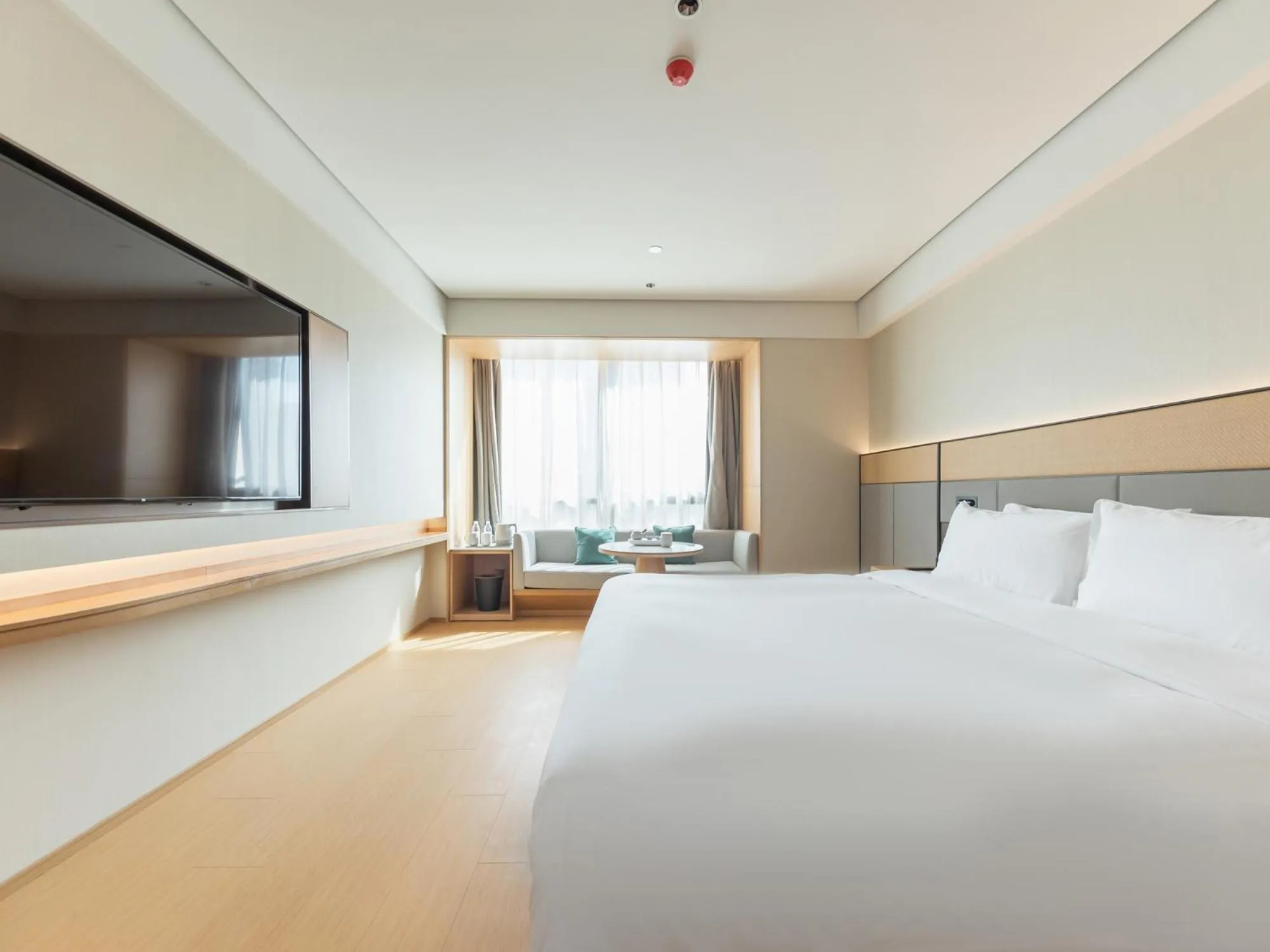 Bed in JI Hotel Suzhou North High Speed Railway Station Subway Station