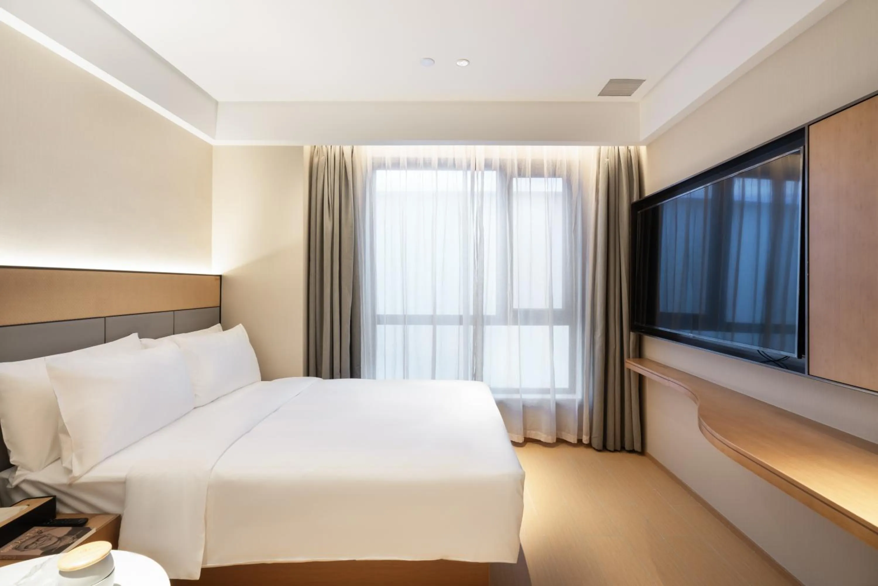 Bed in JI Hotel Guangzhou Tower