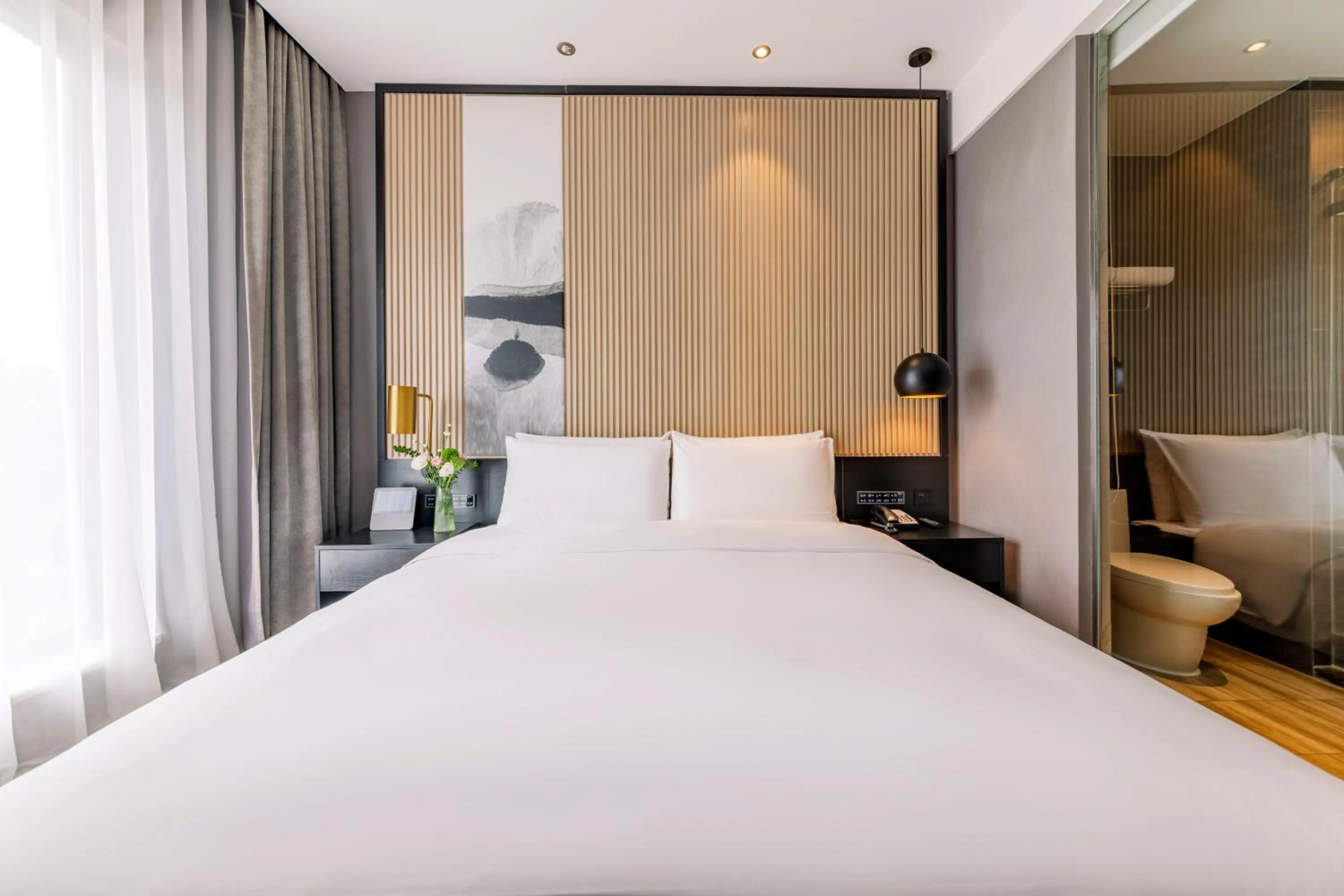 Bed in Orange Crystal Hotel Shenzhen Baoan Airport Bihaiwan