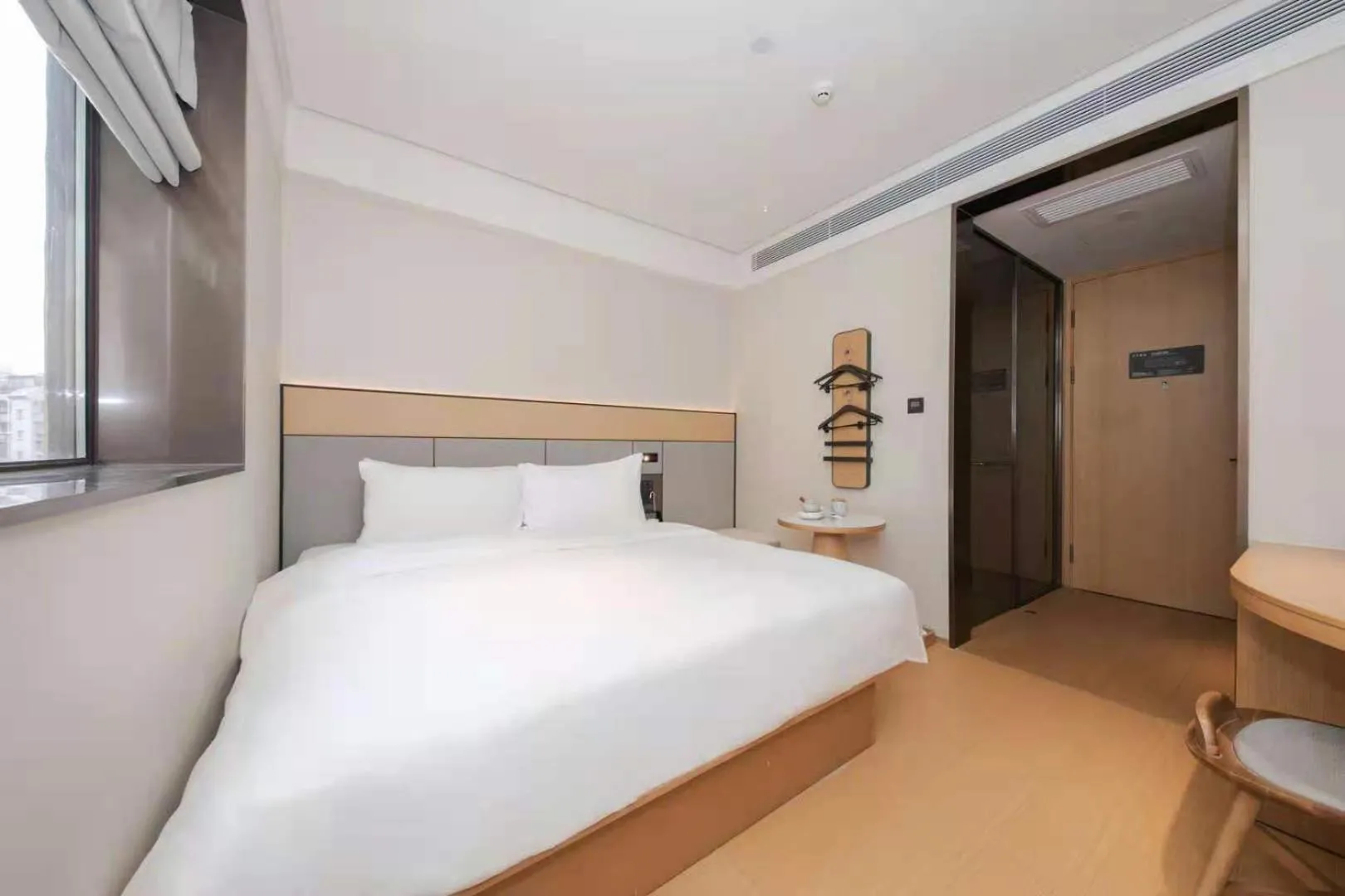 Bed in JI Hotel Beijing International Exhibition Center Sanyuan West Bridge