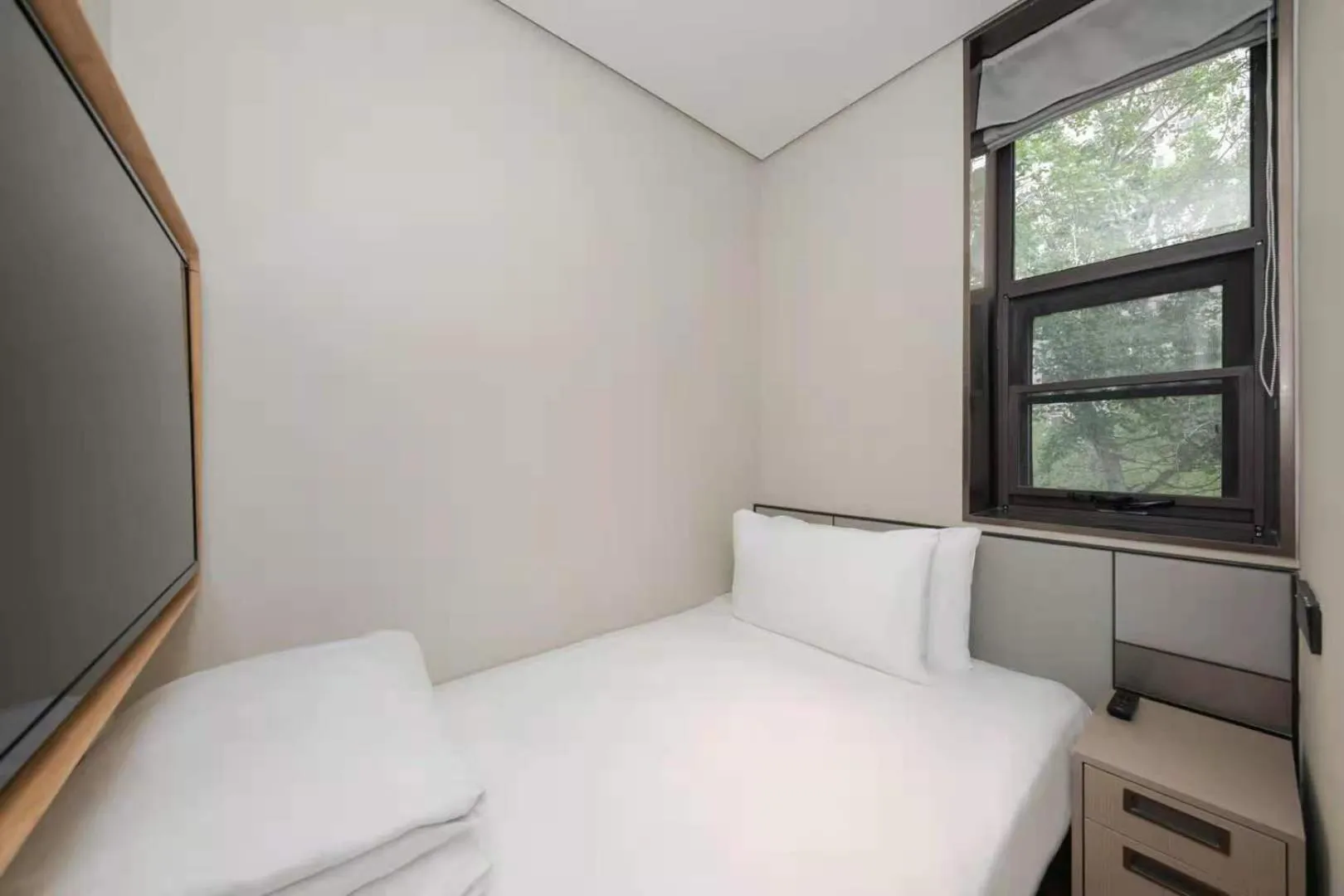 Bed in JI Hotel Beijing International Exhibition Center Sanyuan West Bridge