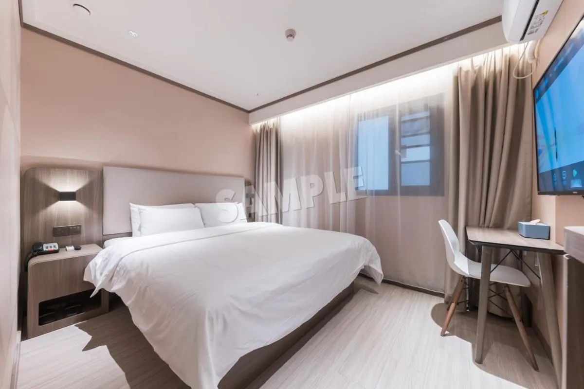 Bed in Hanting Hotel Shenzhen Vanke Yuncheng Xili Subway Station