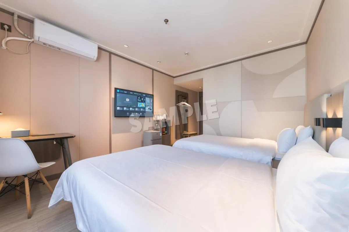 Bed in Hanting Hotel Shenzhen Vanke Yuncheng Xili Subway Station