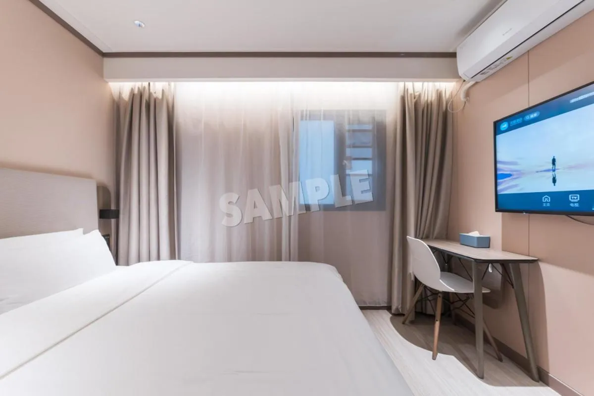 Bed in Hanting Hotel Shenzhen Vanke Yuncheng Xili Subway Station