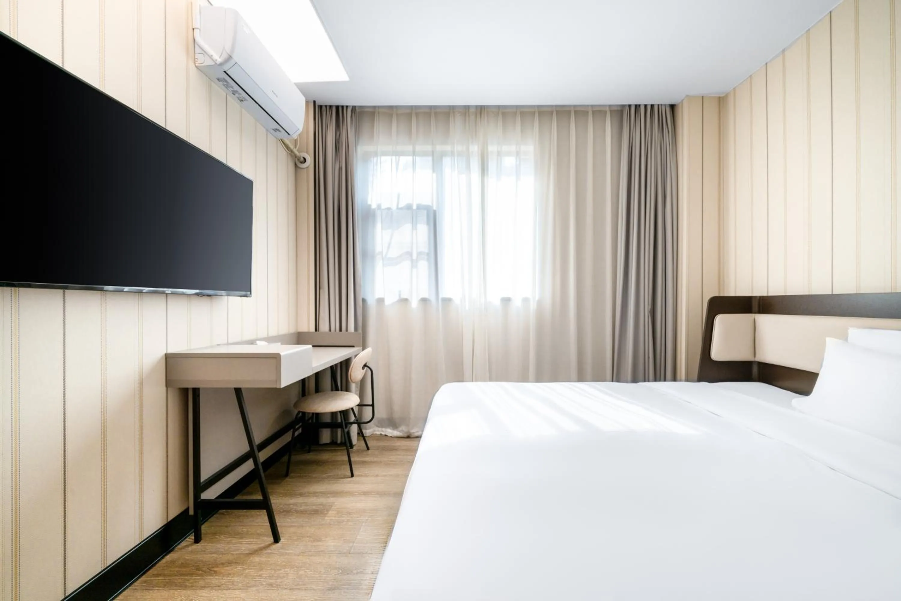 Bed in Hanting Hotel Shenzhen Coast City Nanyou Clothing City