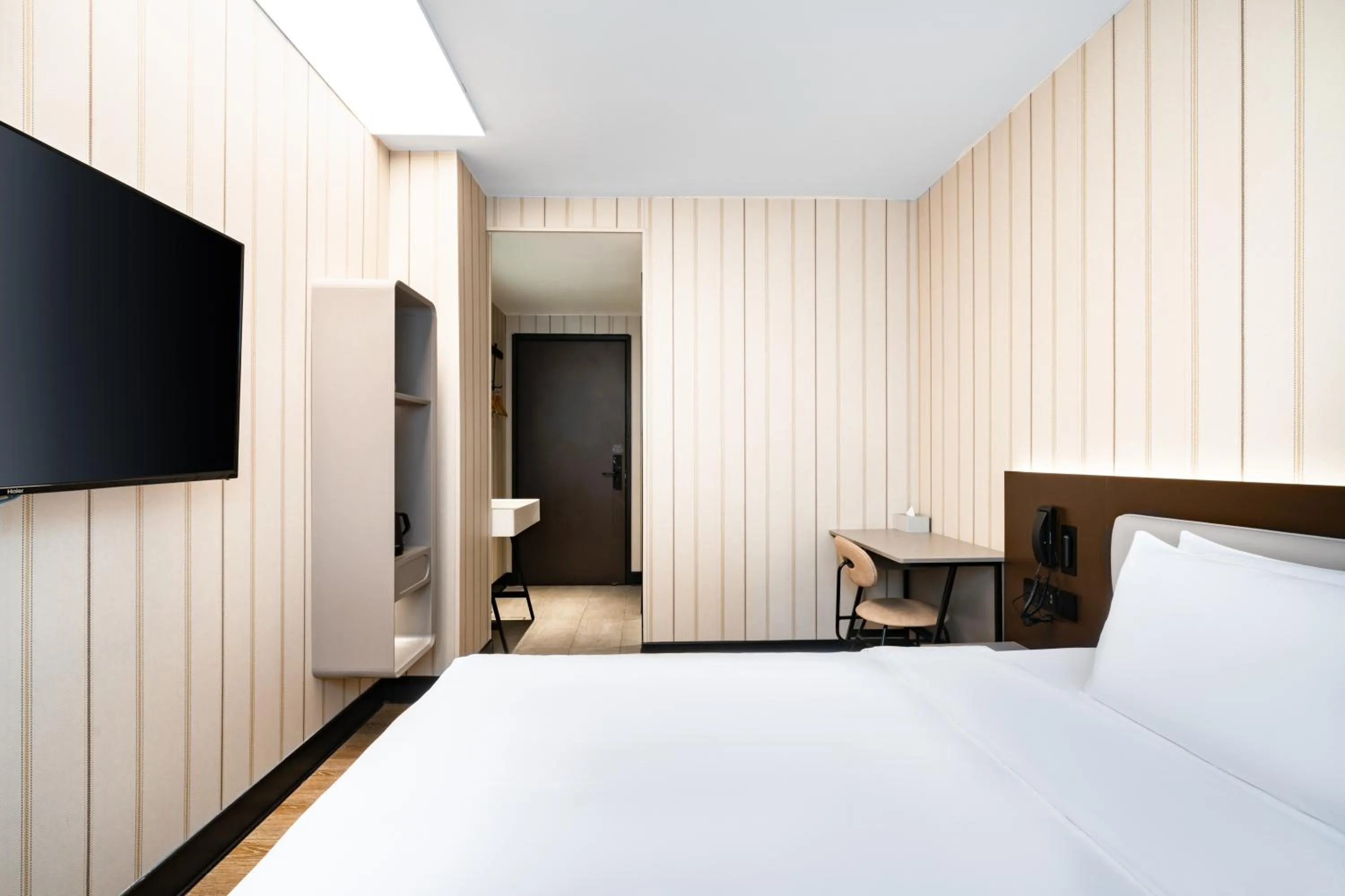 Bed in Hanting Hotel Shenzhen Coast City Nanyou Clothing City