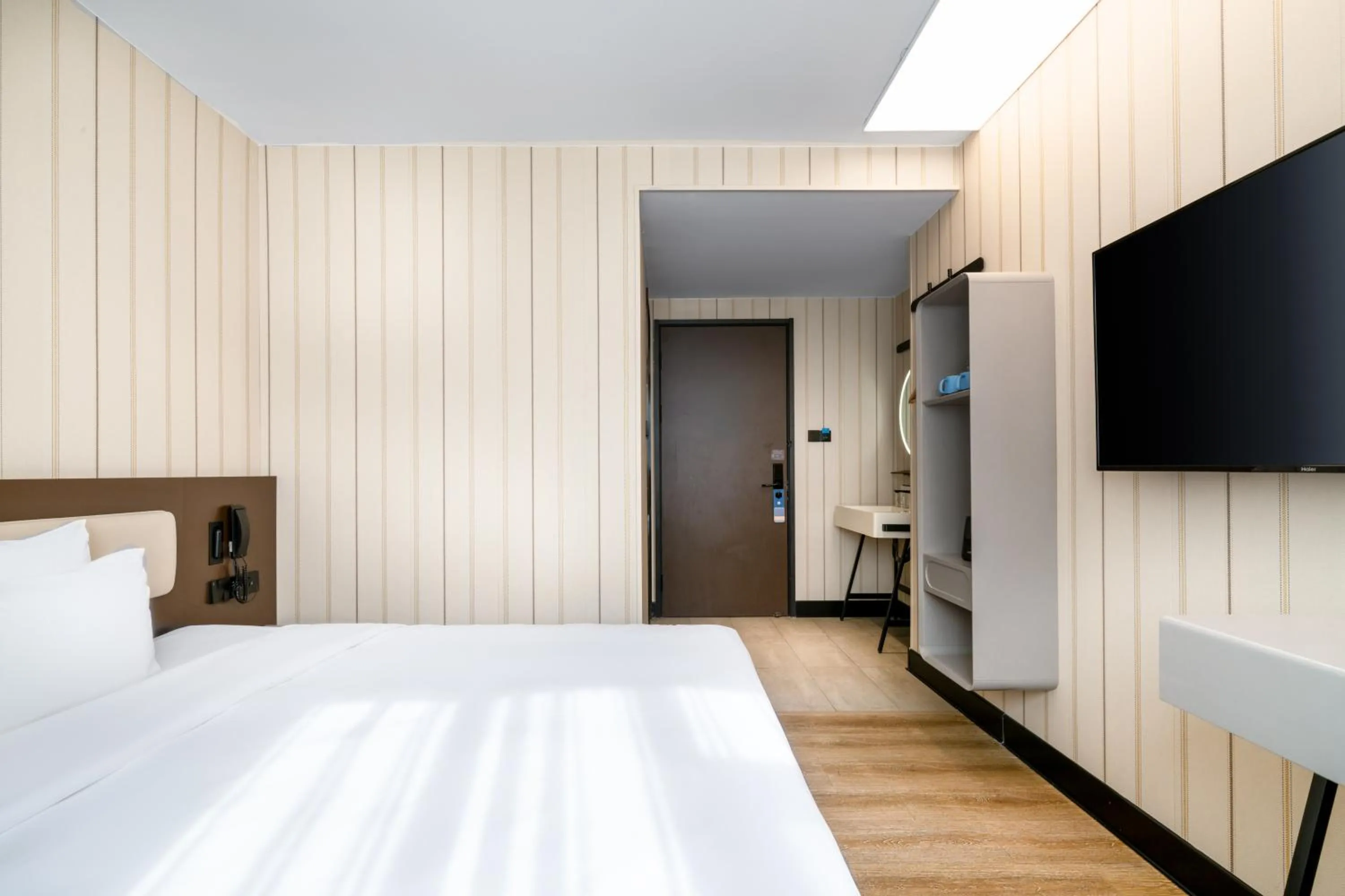 Bed in Hanting Hotel Shenzhen Coast City Nanyou Clothing City