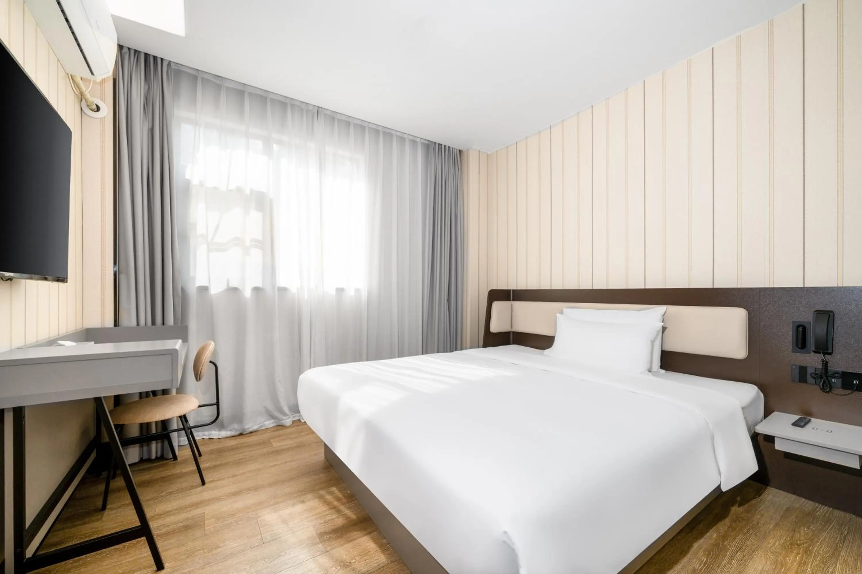 Bed in Hanting Hotel Shenzhen Coast City Nanyou Clothing City