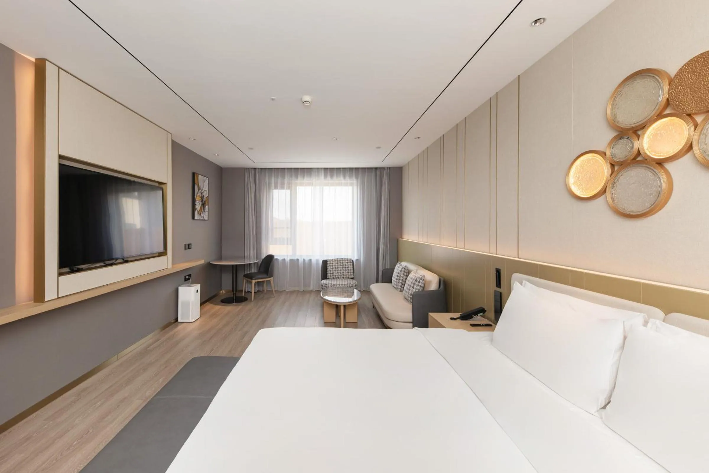 Bed in Orange Hotel Beijing Yizhuang Bridge Subway Station