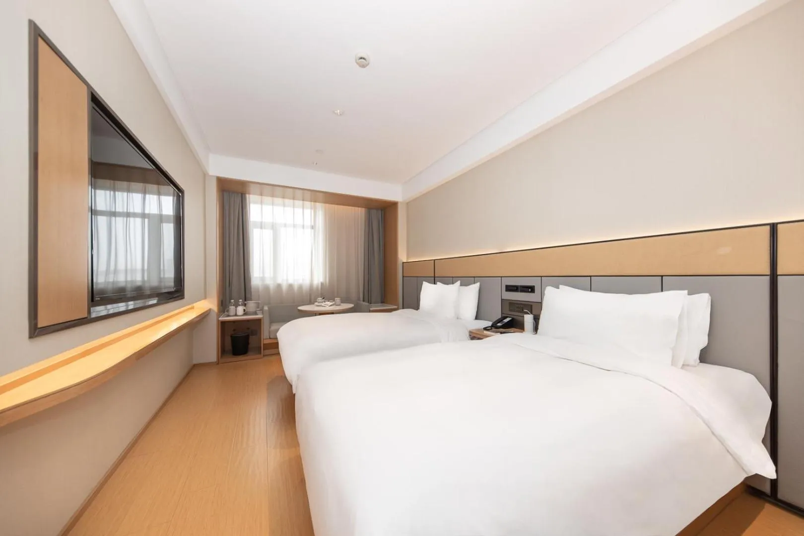 Bed in JI Hotel Shanghai Xinzhuang Qixin Road Qixin Road