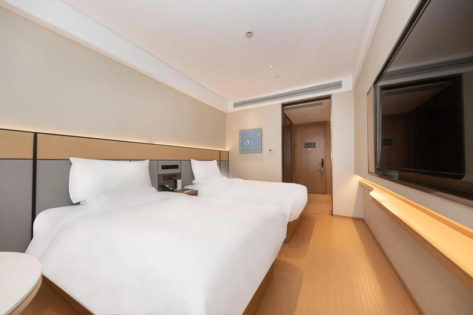 Bed in JI Hotel Shanghai Xinzhuang Qixin Road Qixin Road