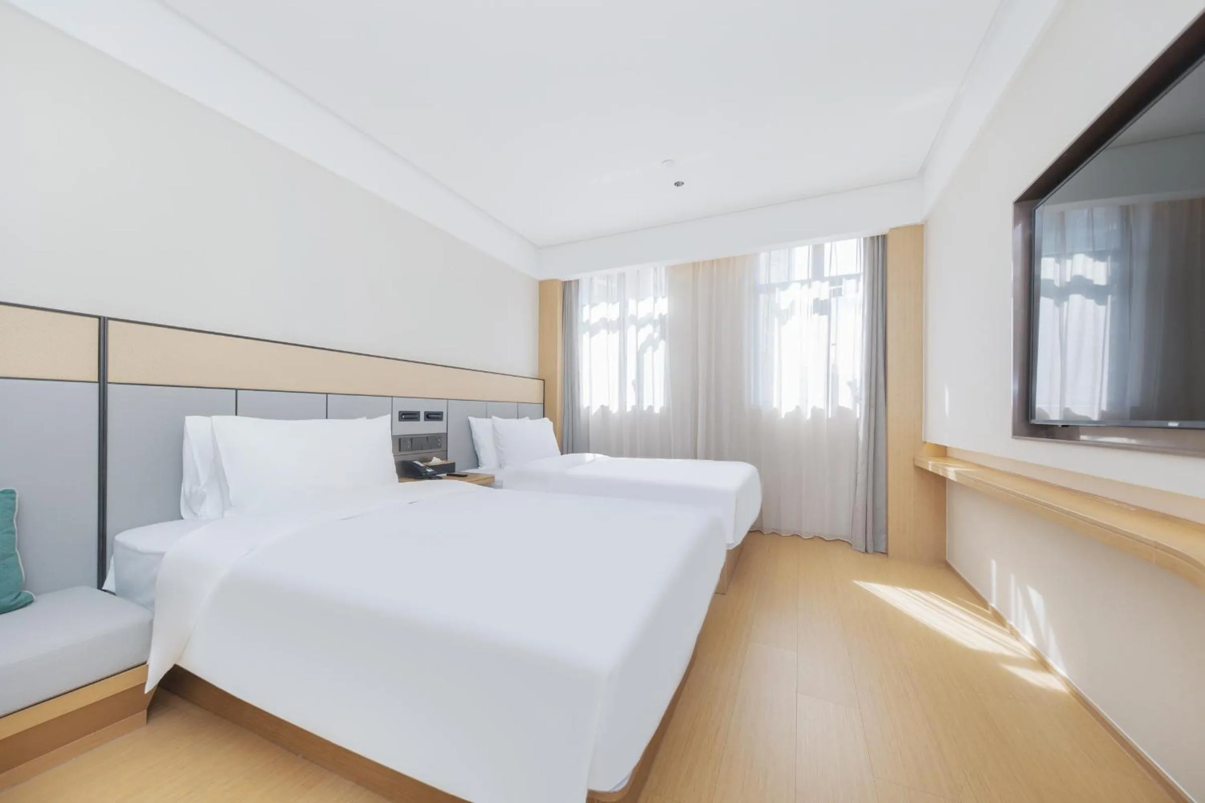 Bedroom, Bed in JI Hotel Shanghai South Railway Station Jinjiang Amusement Park (formerly Jinjiang Amusement Park Subway Station Branch)