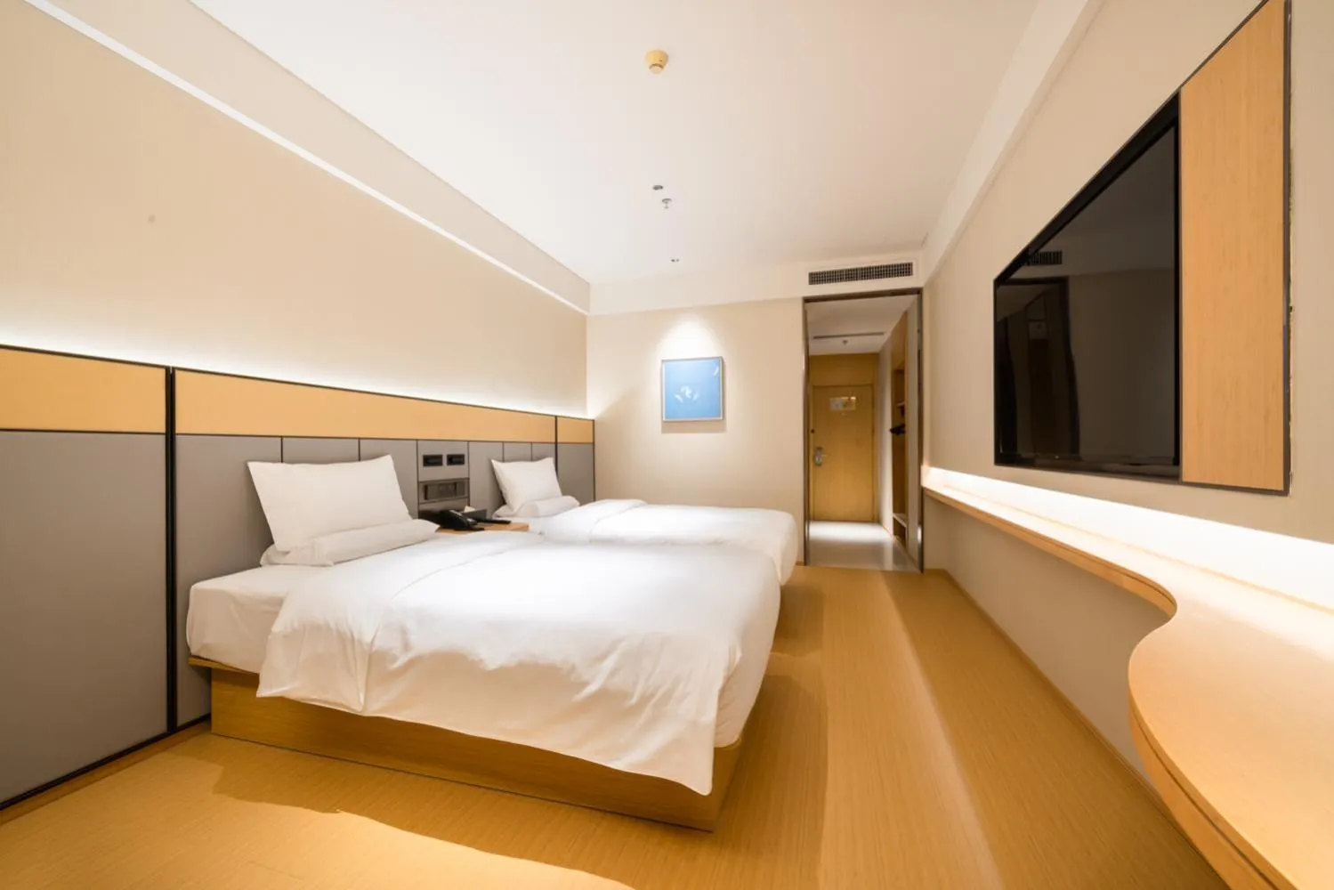 Bed in JI Hotel Guangzhou Sports Center Tianhe North Road