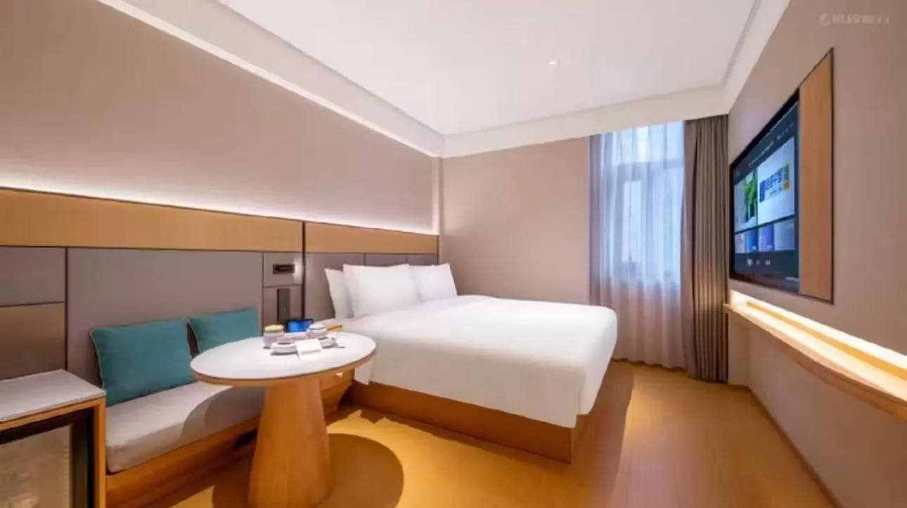 Bed in JI Hotel Beijing Yansha Sanyuan Bridge